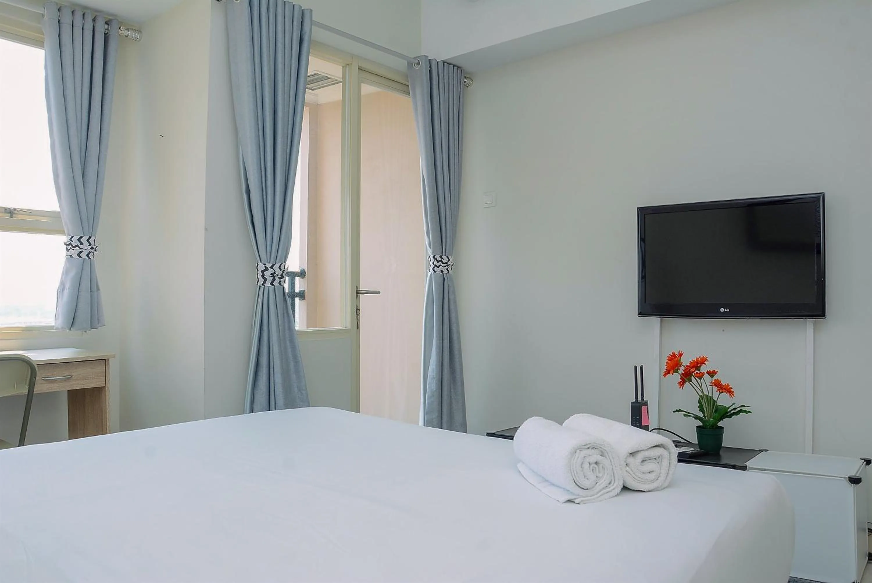 Bed in Elegant Studio Apartment Margonda Residence 5 By Travelio