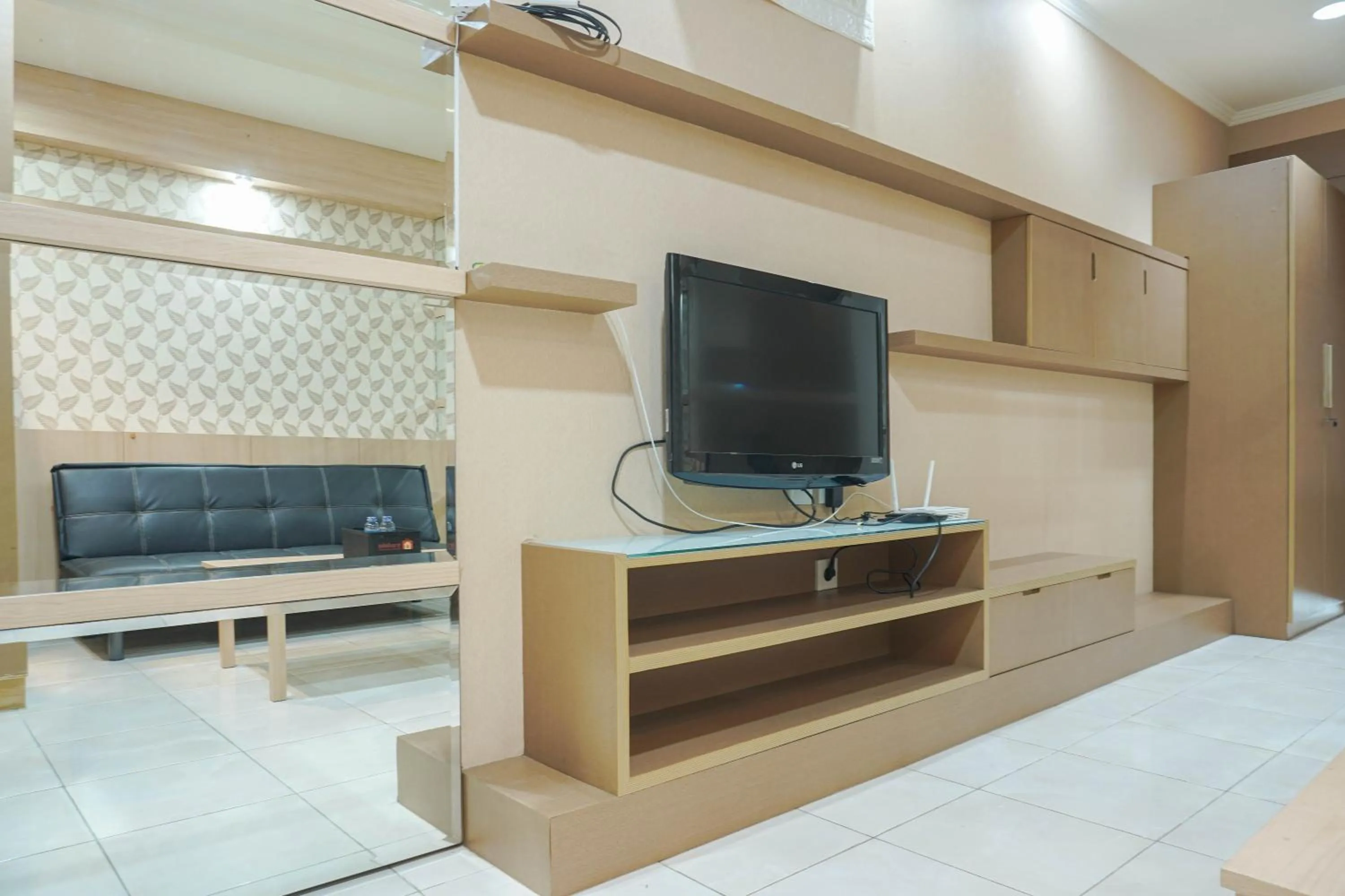 Strategic 1BR The Boulevard Apartment with Luxurious Design By Travelio