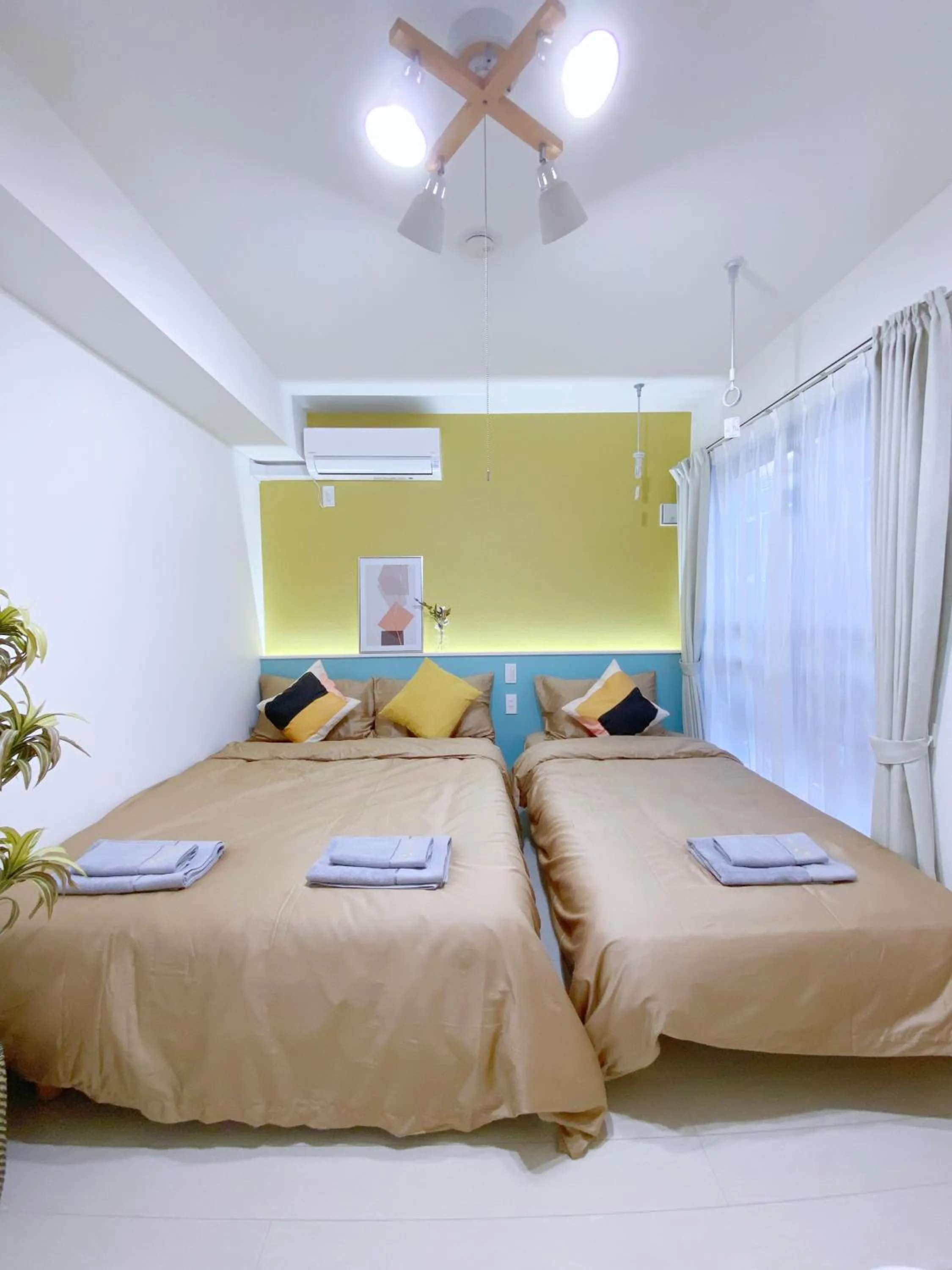 Bed in nestay apartment tokyo ginza