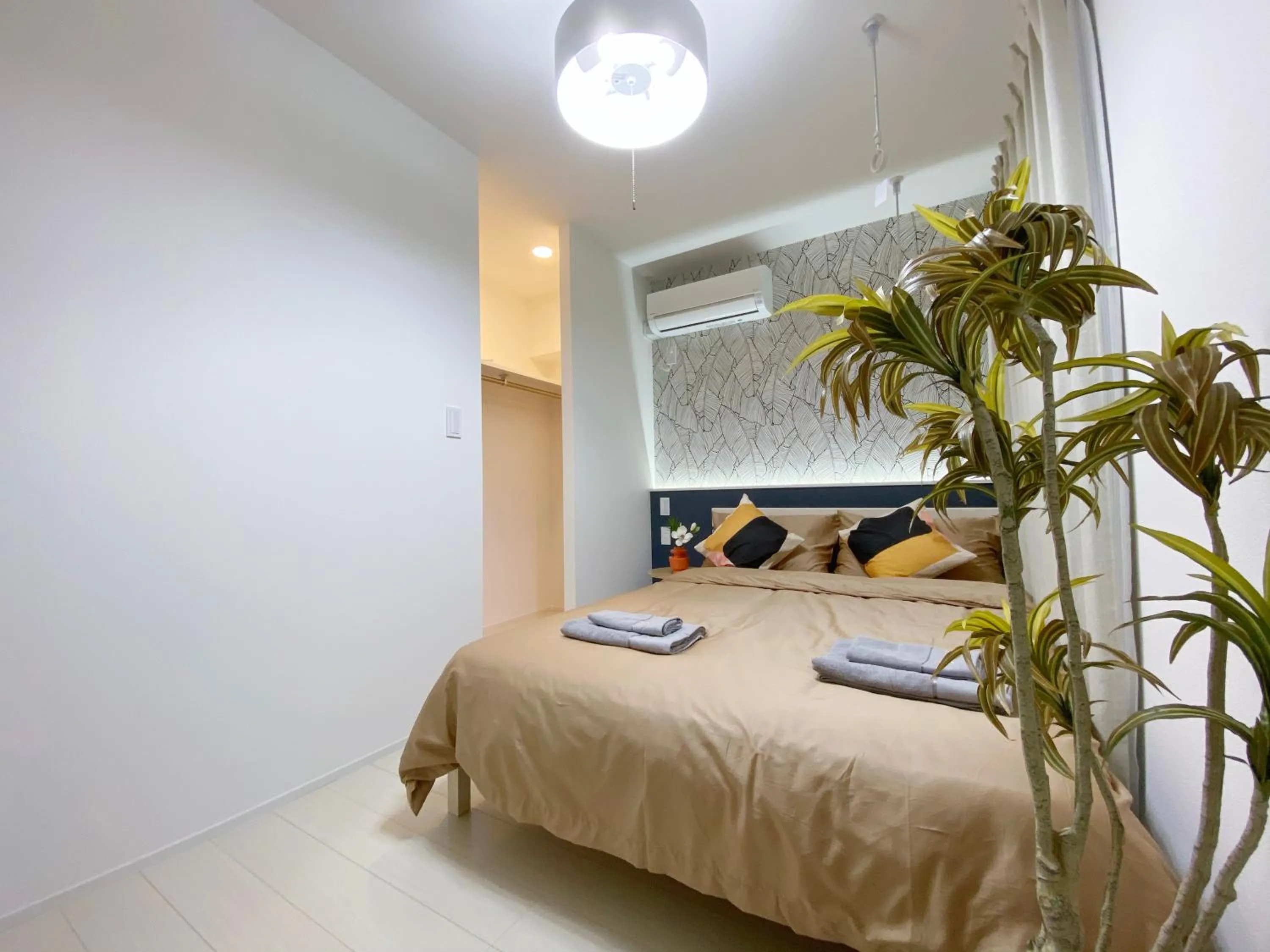 Bed in nestay apartment tokyo ginza