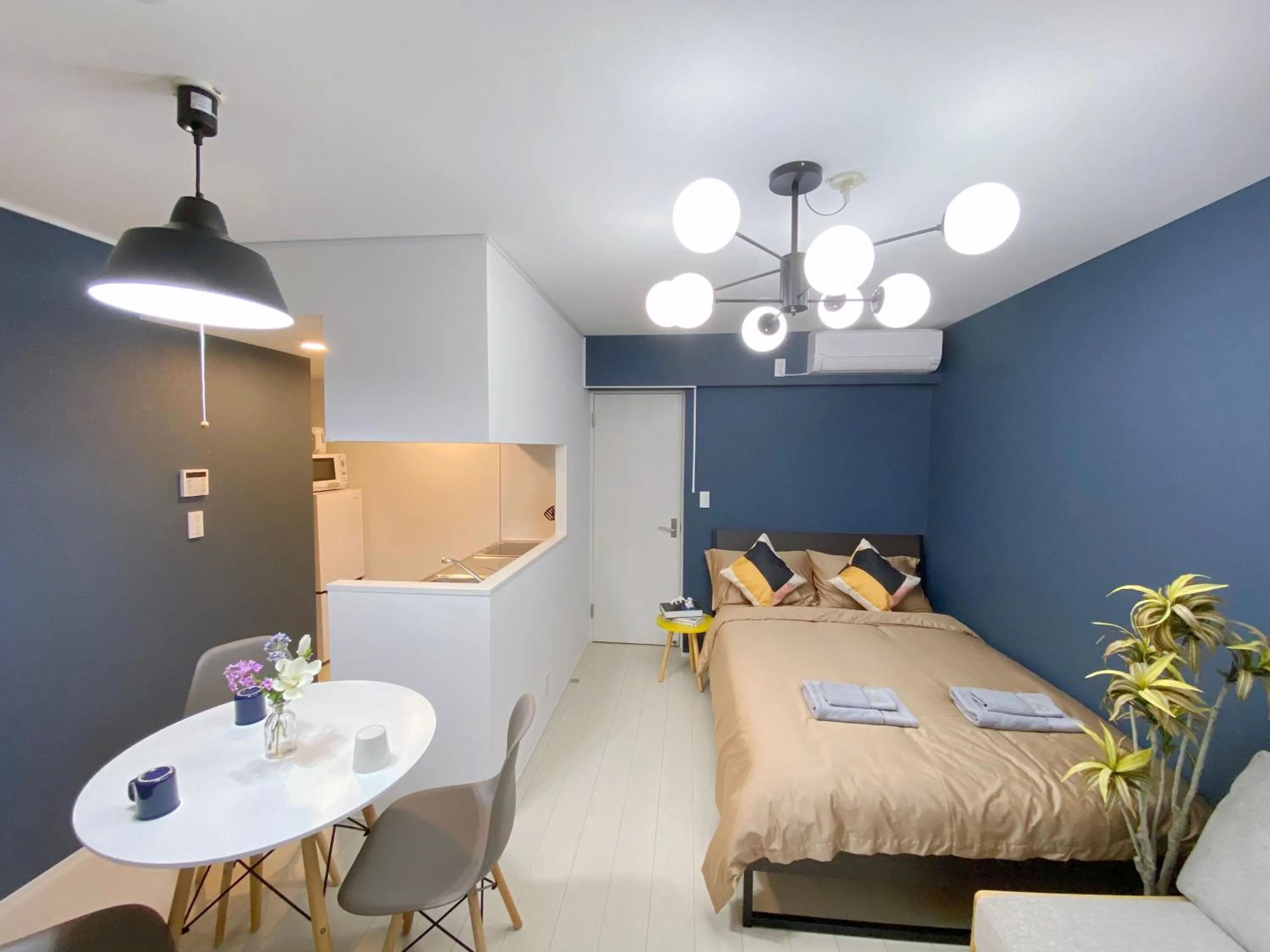 Bed in nestay apartment tokyo ginza