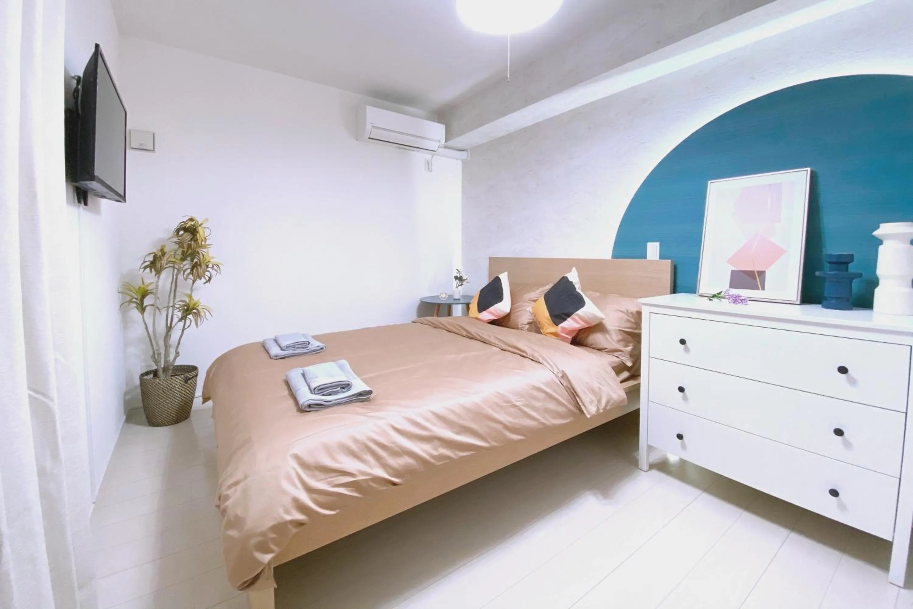 Bed in nestay apartment tokyo ginza