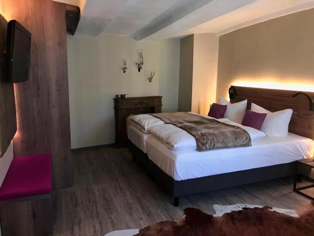 Bed in Romantisches Hotel Menzhausen