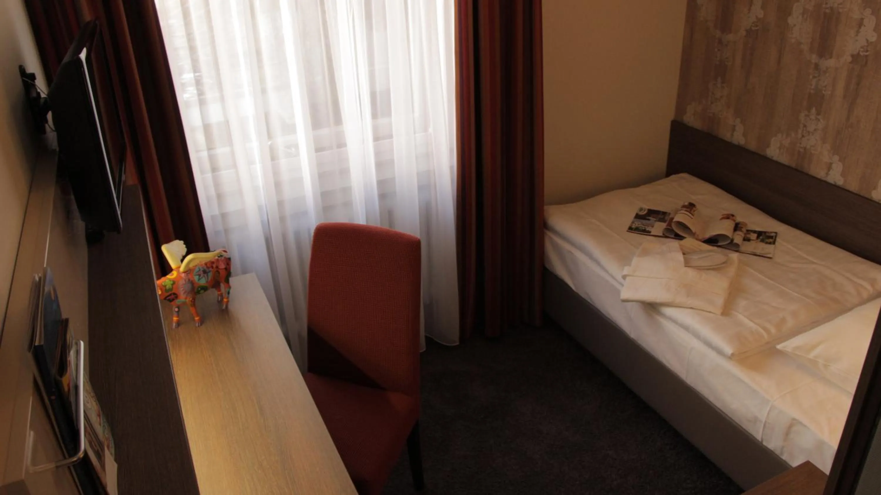 Photo of the whole room, Bed in Romantisches Hotel Menzhausen