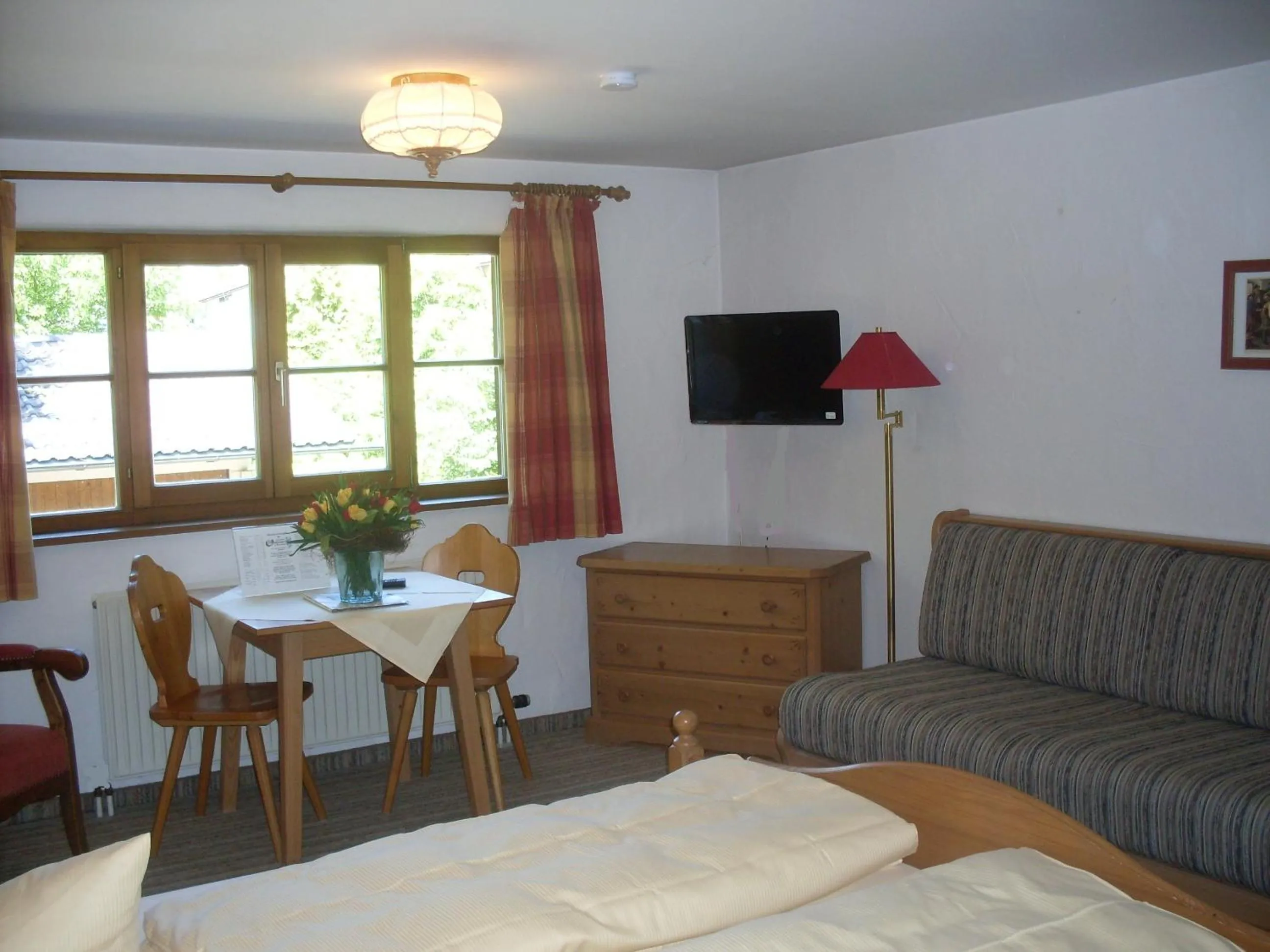 Photo of the whole room, Bed in Gasthof Ochsenwirt