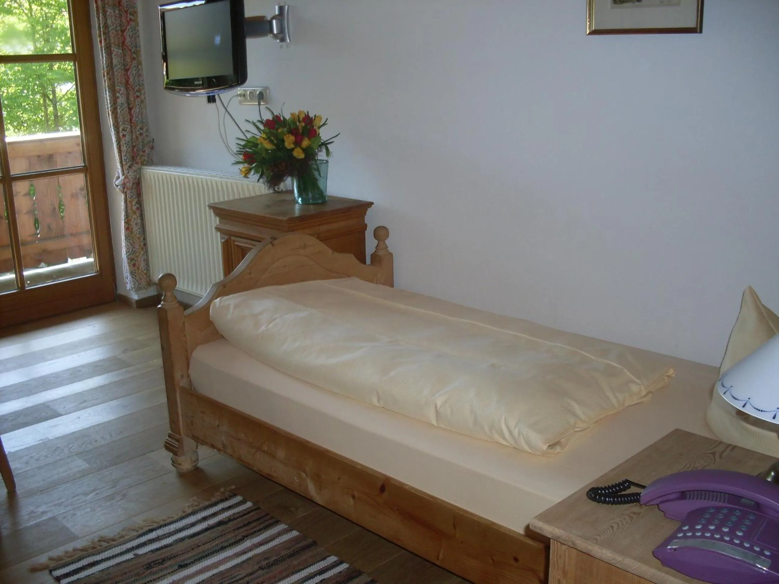 Photo of the whole room, Bed in Gasthof Ochsenwirt
