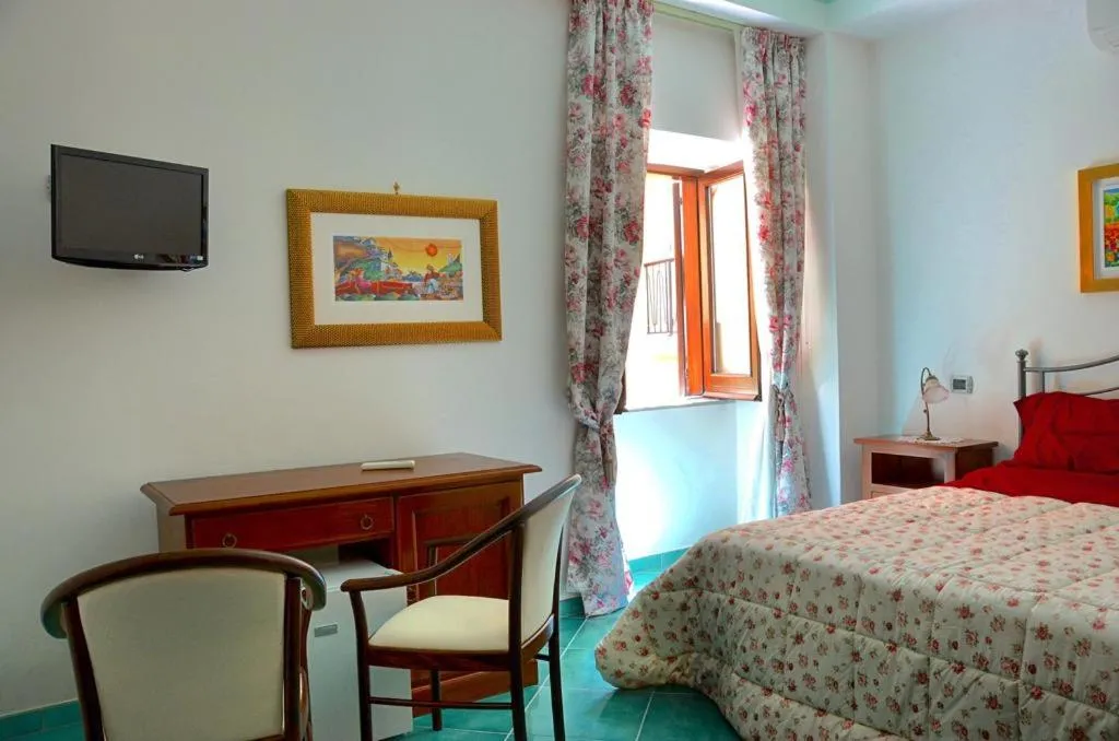 Seating area, Bed in Donna Alda Affittacamere Capitello dal 2012