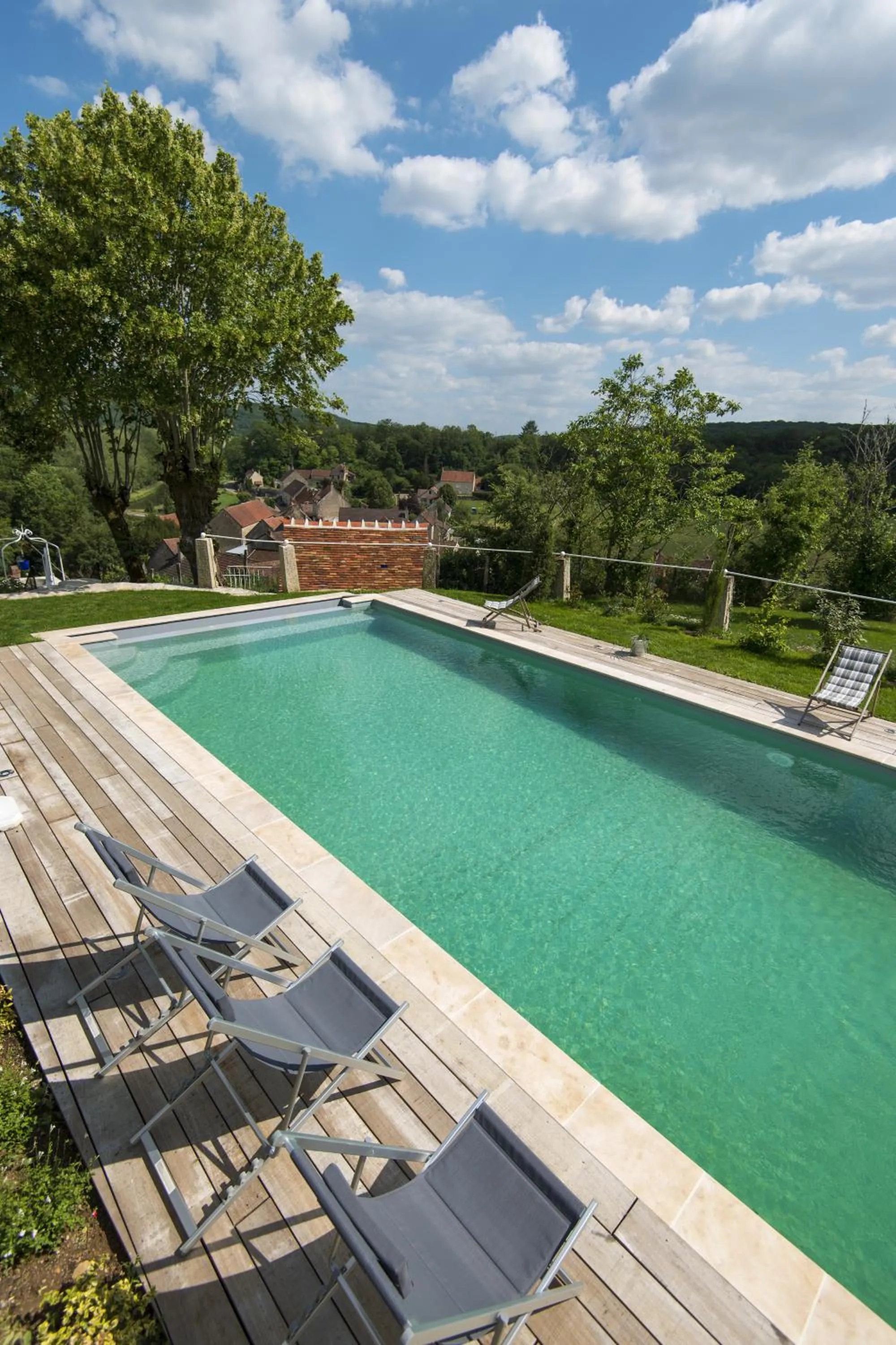 Pool view in Le Domaine des Carriers - Gites