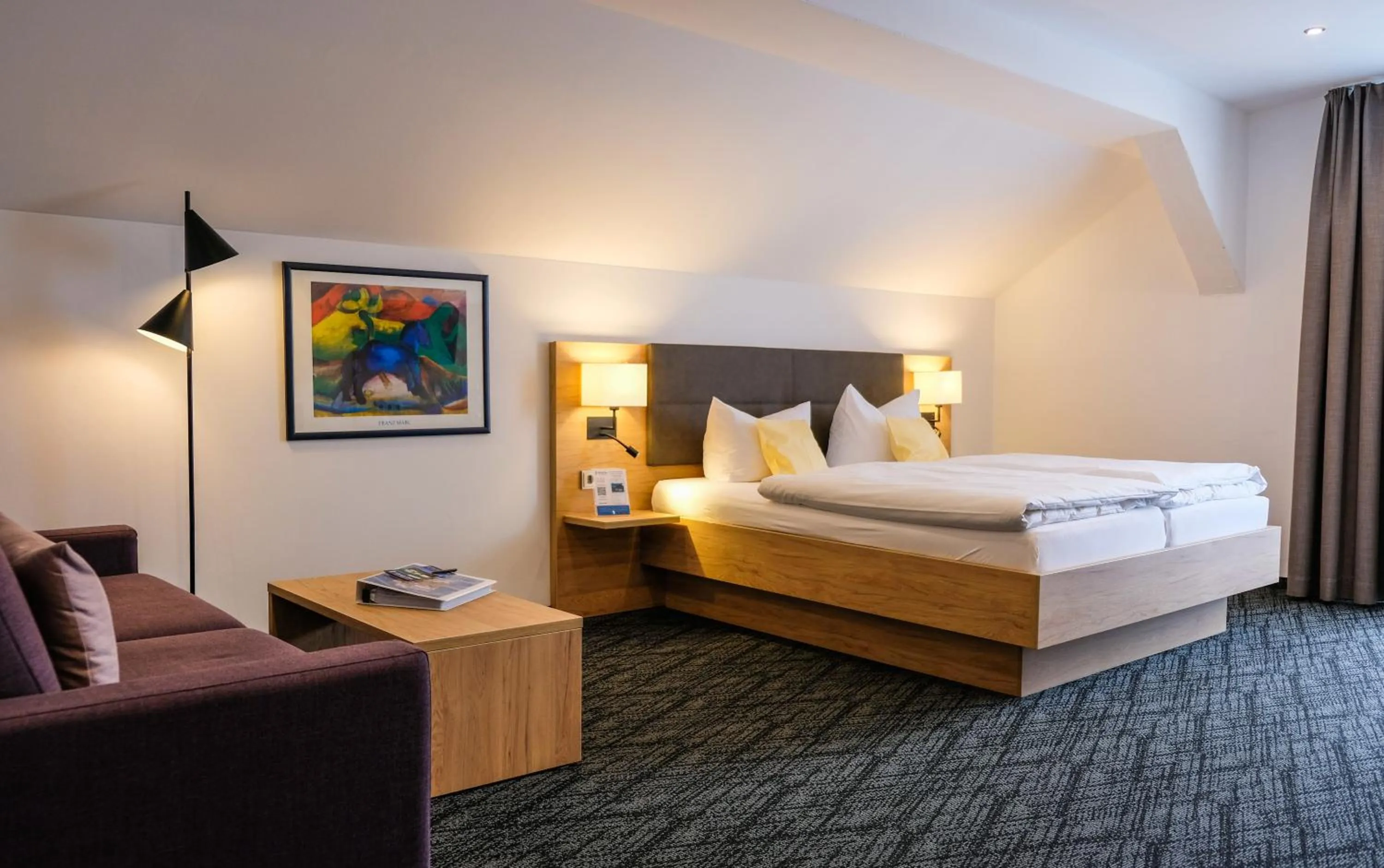 Photo of the whole room, Bed in Seehotel Grauer Bär