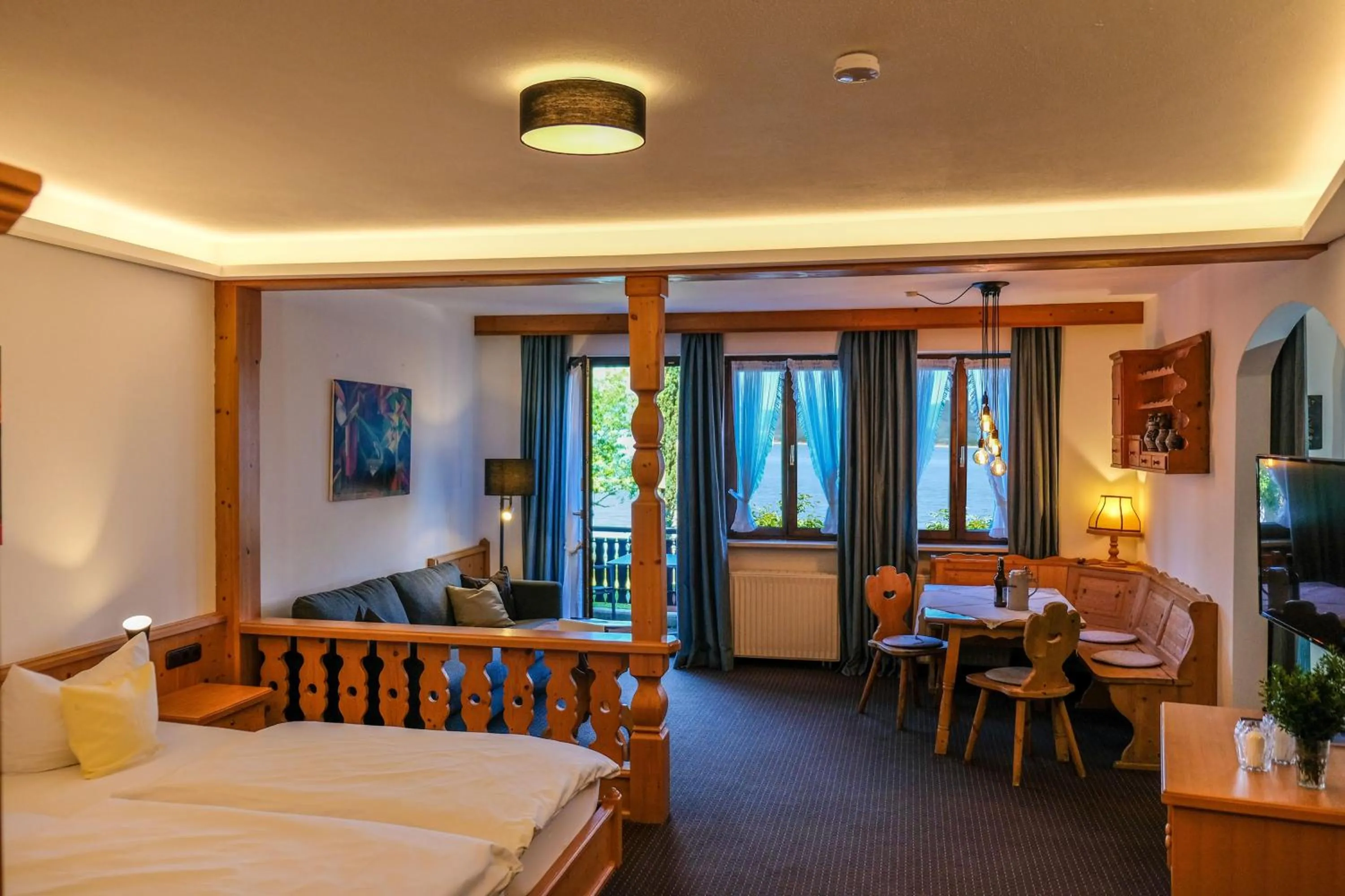Photo of the whole room, Bed in Seehotel Grauer Bär