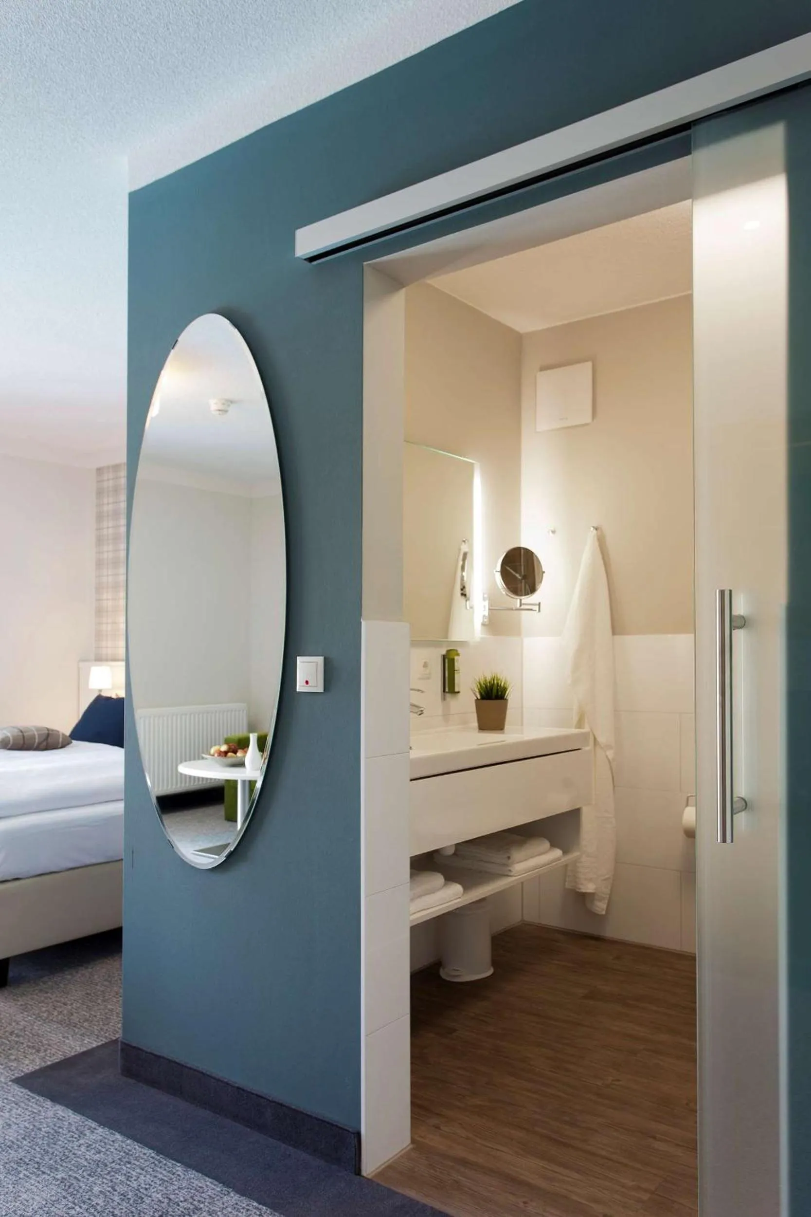 Bathroom, Bed in Dorint Resort Baltic Hills Usedom