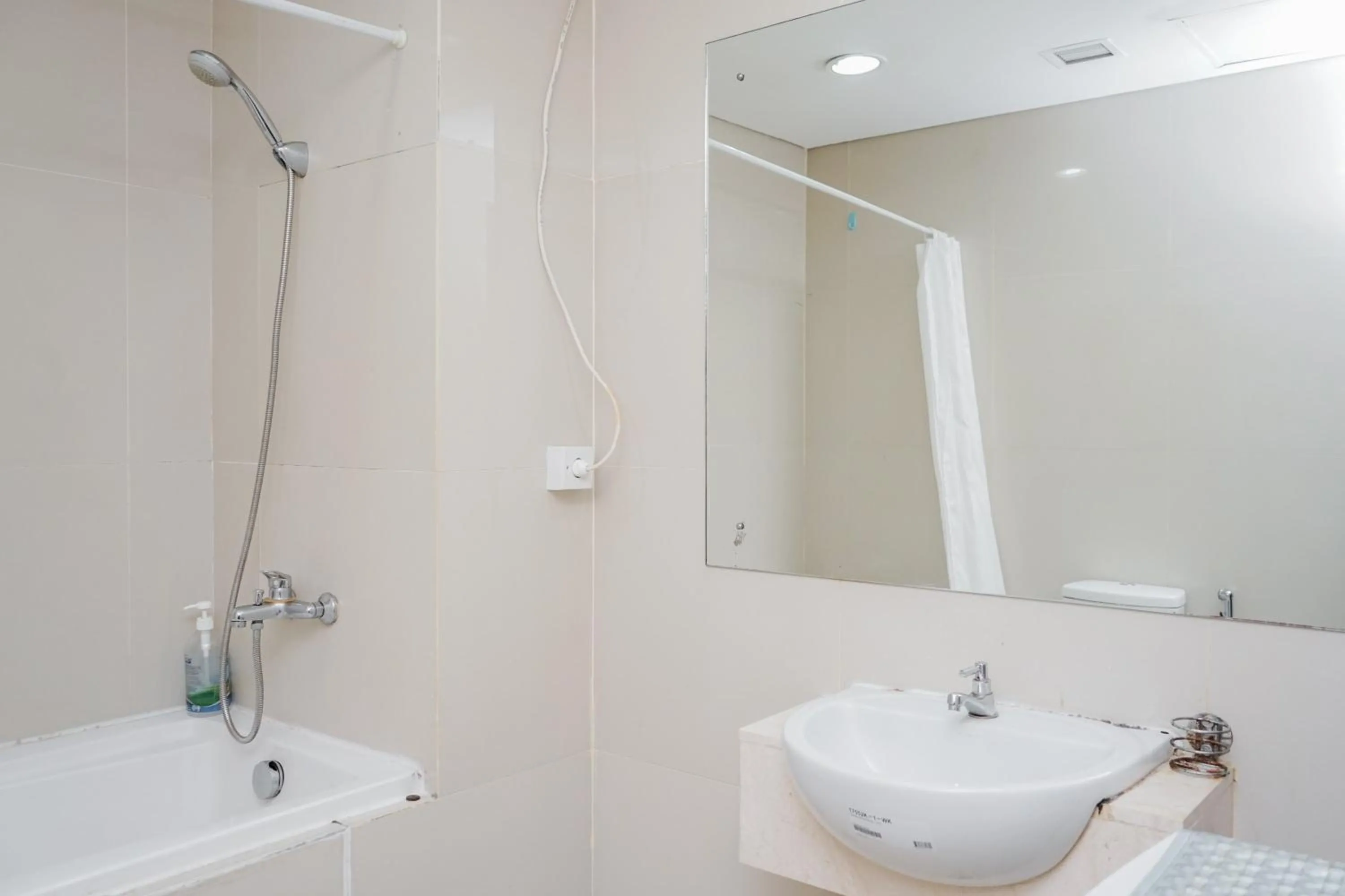 Fully Furnished with Comfortable Design 2BR Apartment Atria Residences By Travelio