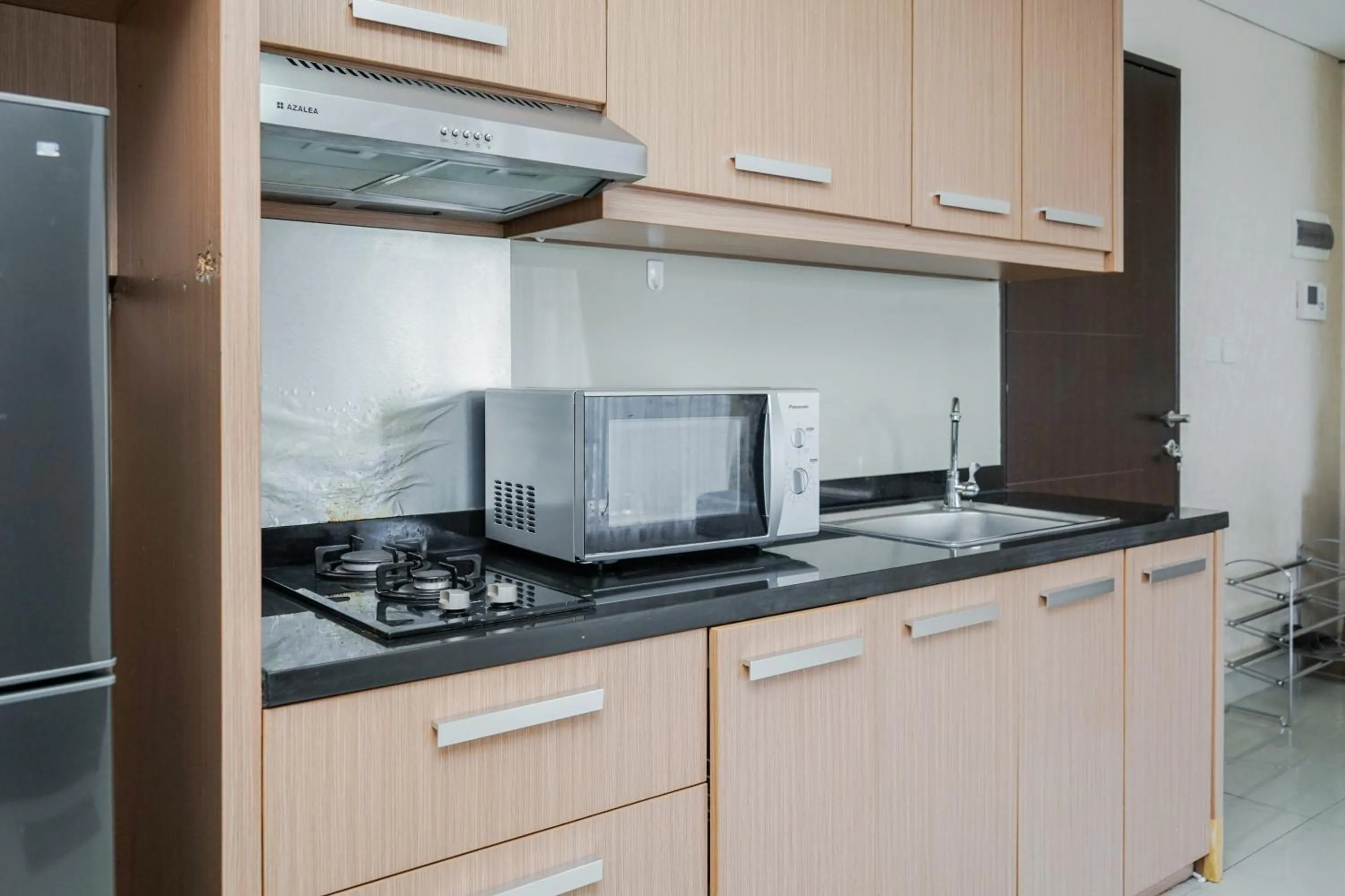 Fully Furnished with Comfortable Design 2BR Apartment Atria Residences By Travelio