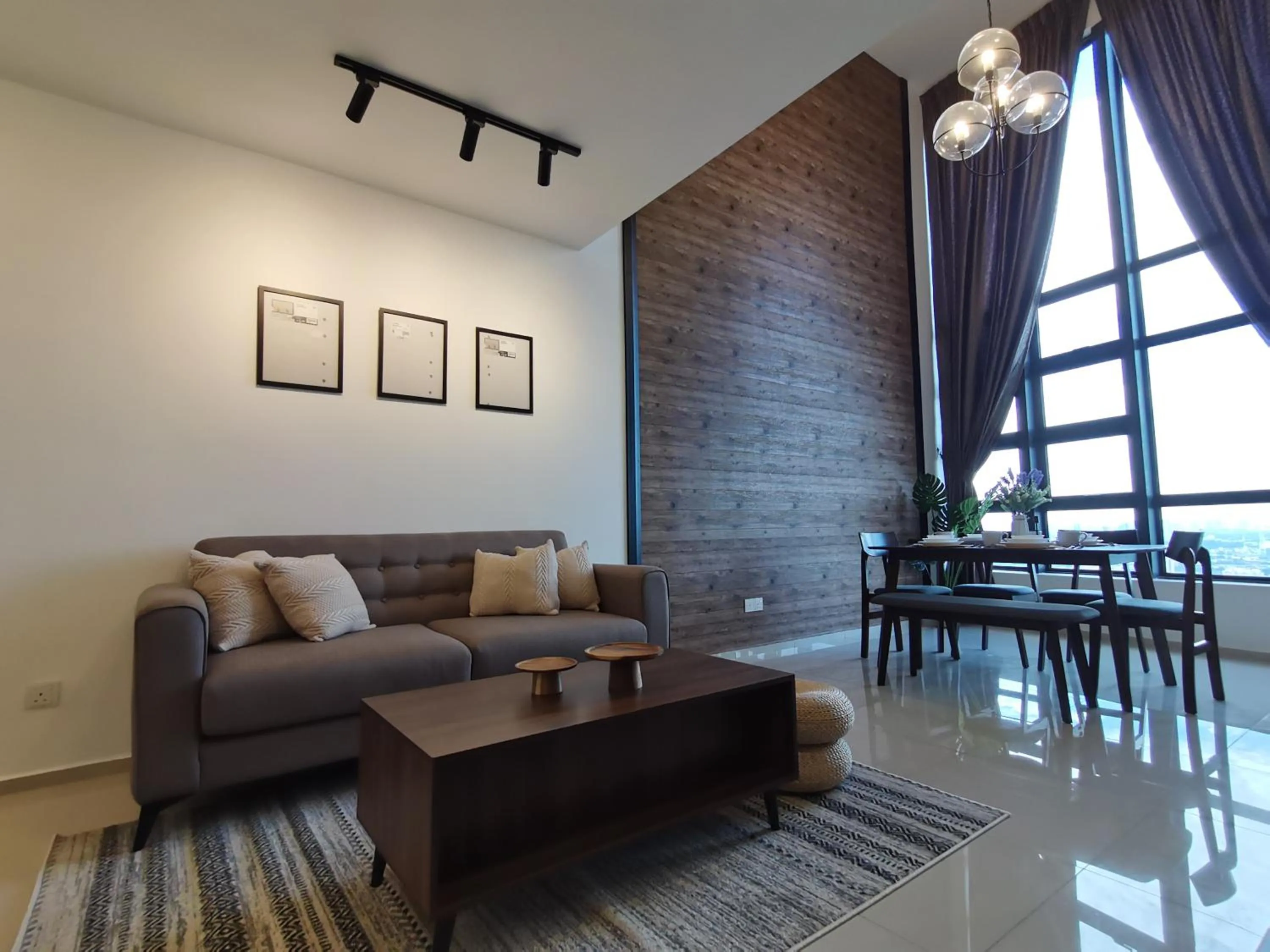 Living room in Eko Cheras Residences by De Space