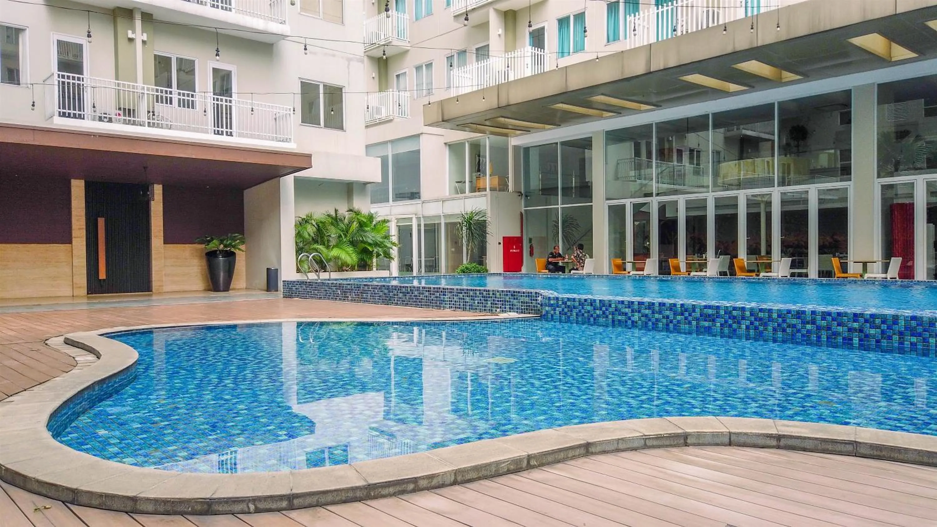 Property building in Minimalist Studio at 11st Floor Bogor Icon Apartment By Travelio