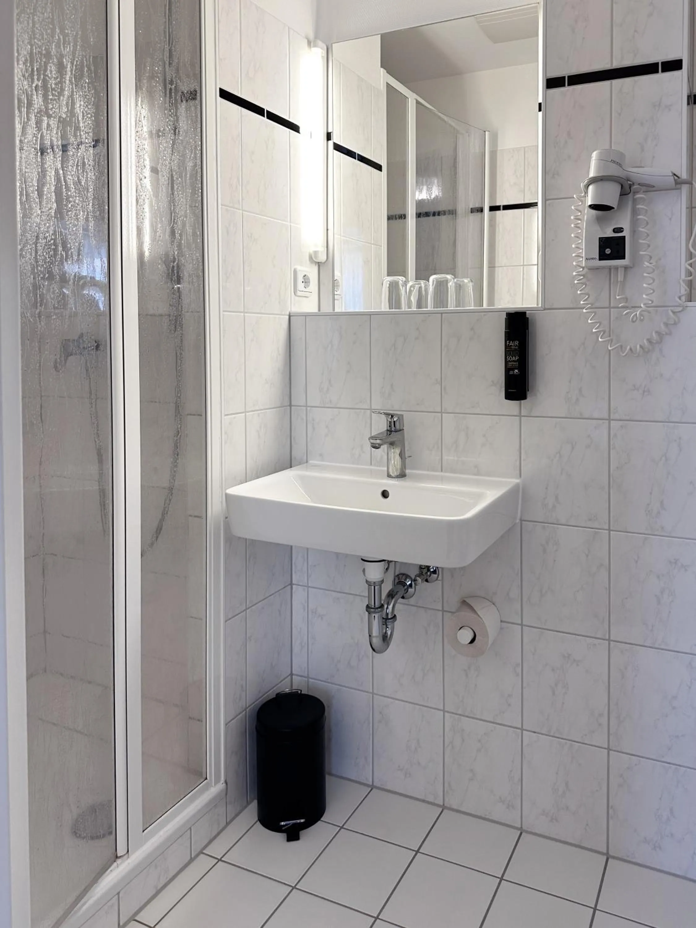 Bathroom in Hotel Berliner Hof by Coffee Fellows Hotels