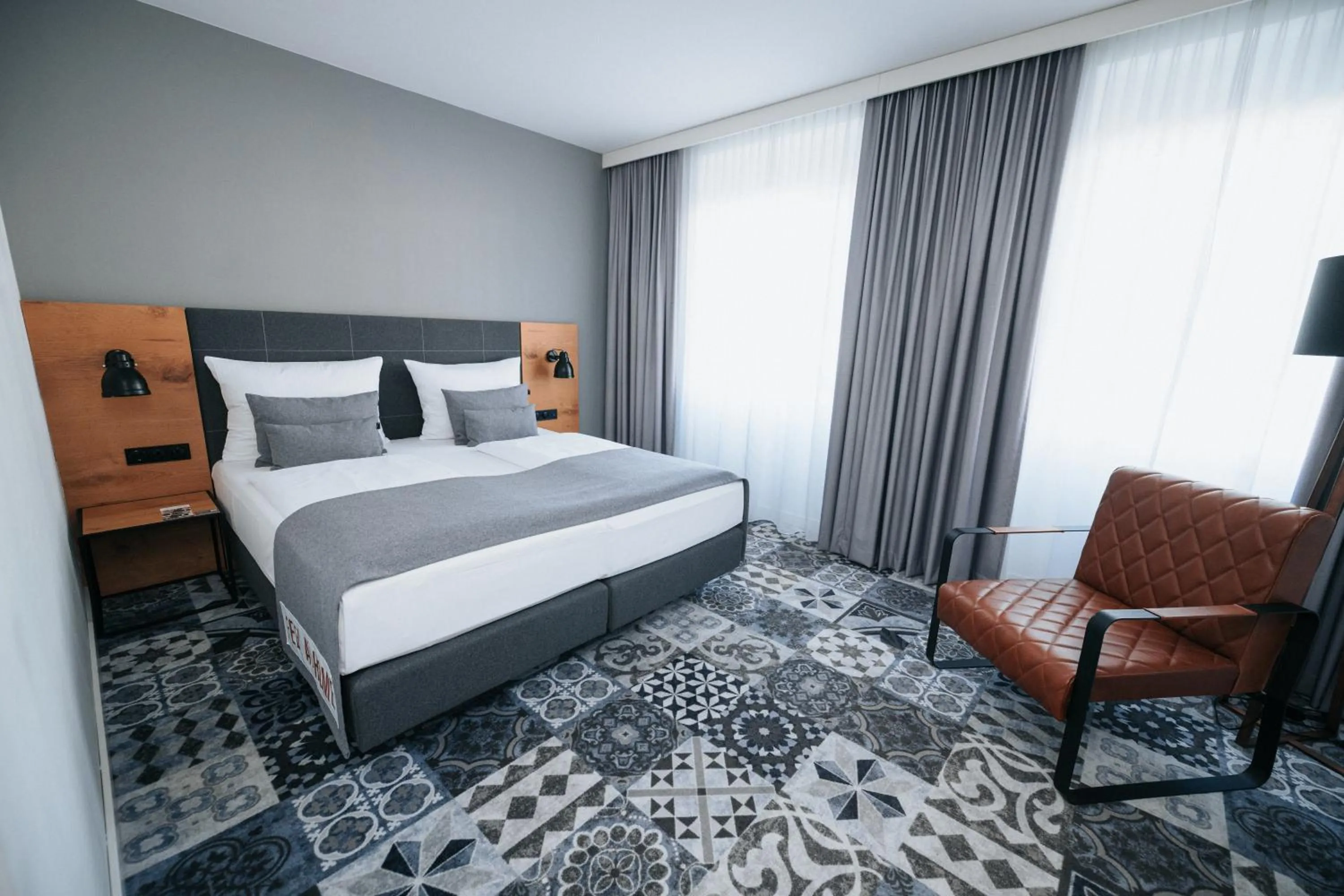 Photo of the whole room, Bed in Hotel Berliner Hof by Coffee Fellows Hotels