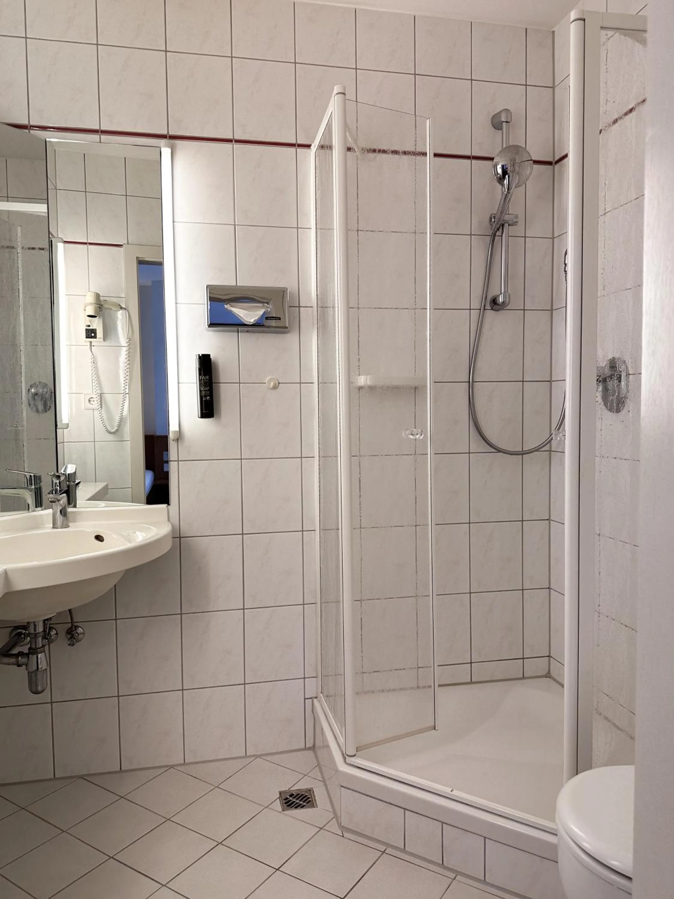 Bathroom in Hotel Berliner Hof by Coffee Fellows Hotels