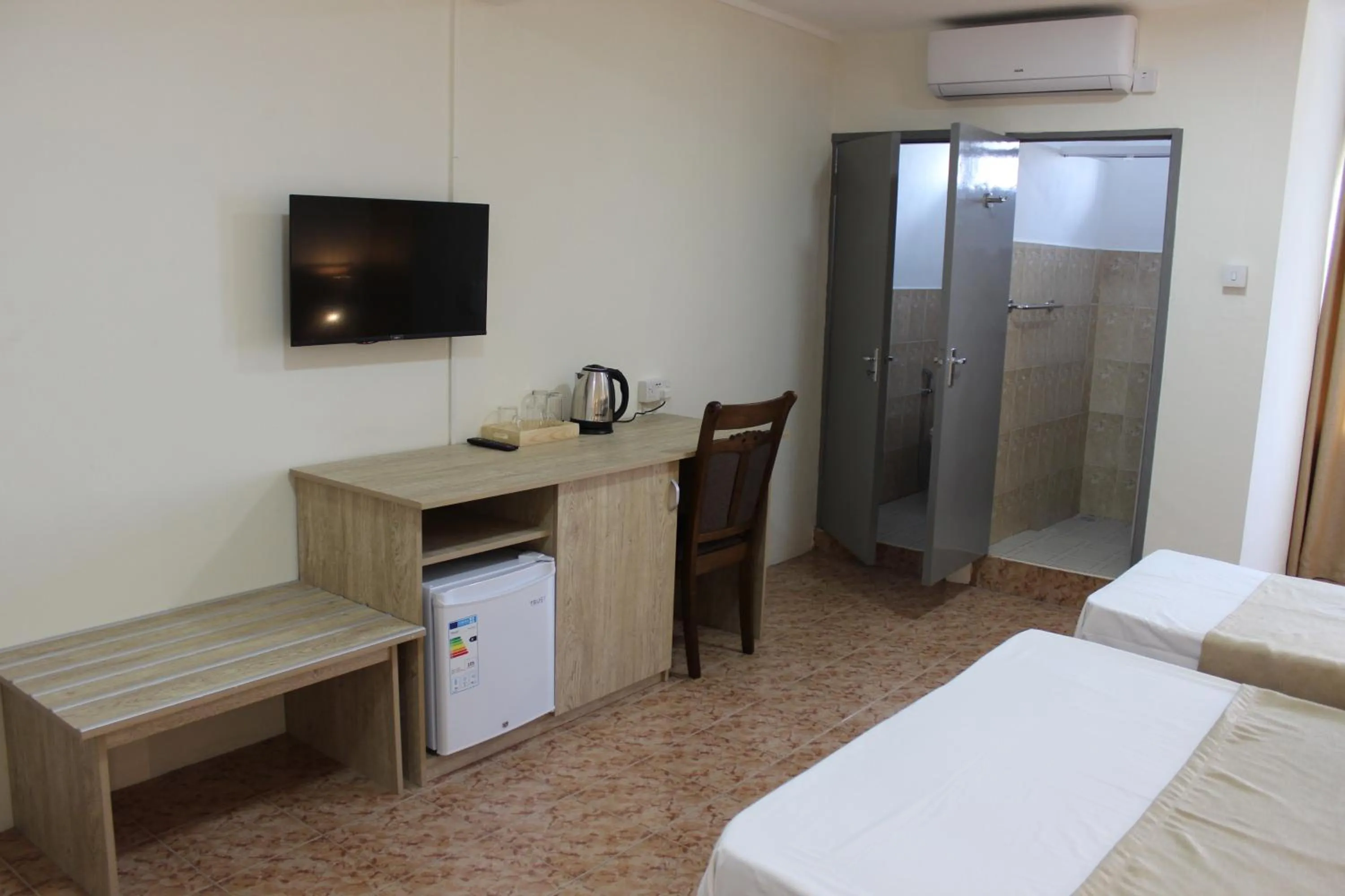 Photo of the whole room, Bed in Sikamifer Tourist Resort