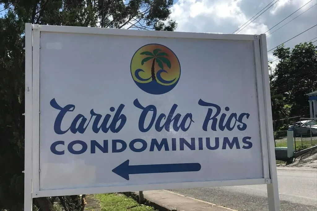 Property logo or sign in Contemporary Ocean view 2bed Carib Ocho Rios Condo
