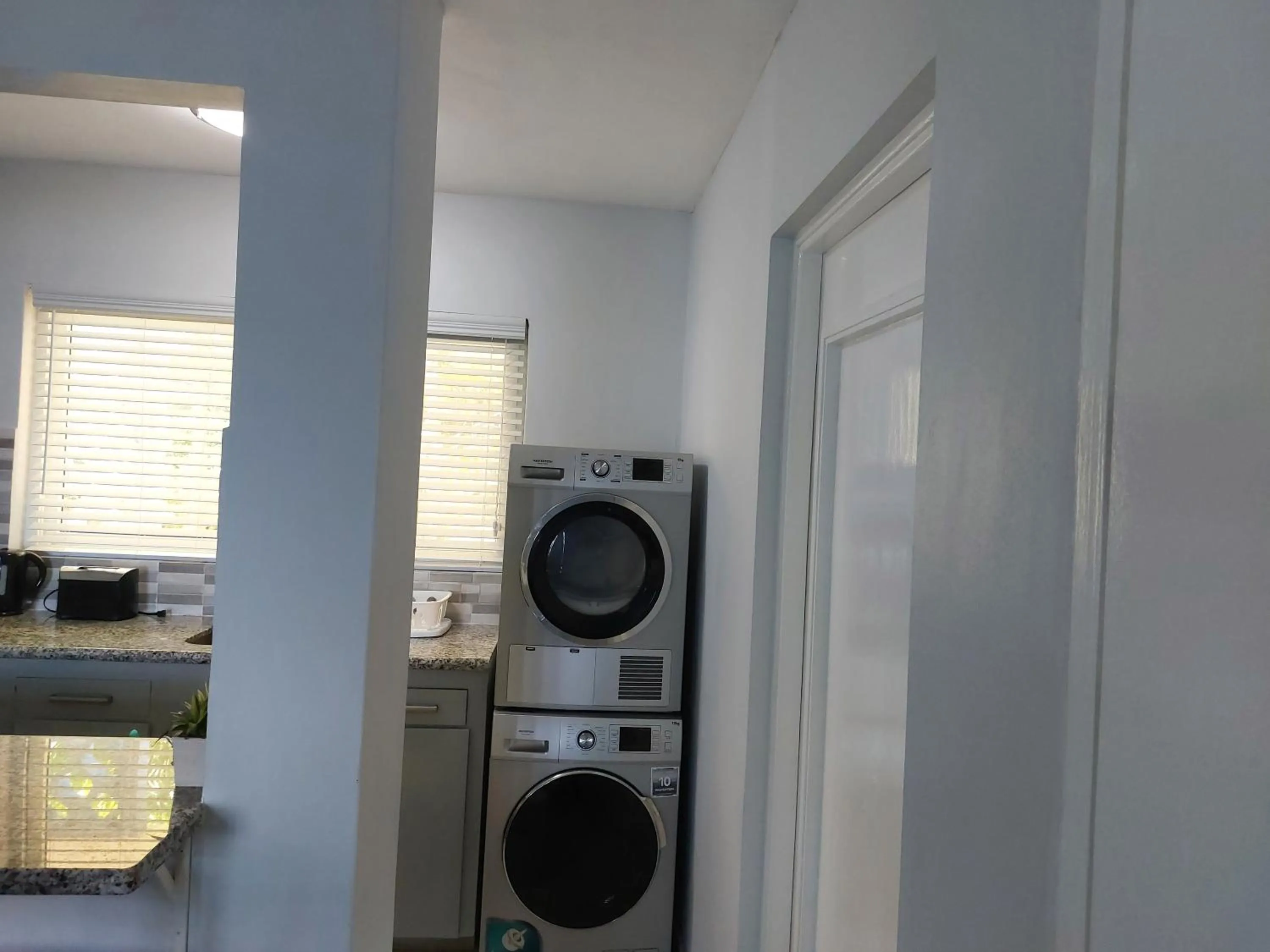 washing machine in Contemporary Ocean view 2bed Carib Ocho Rios Condo
