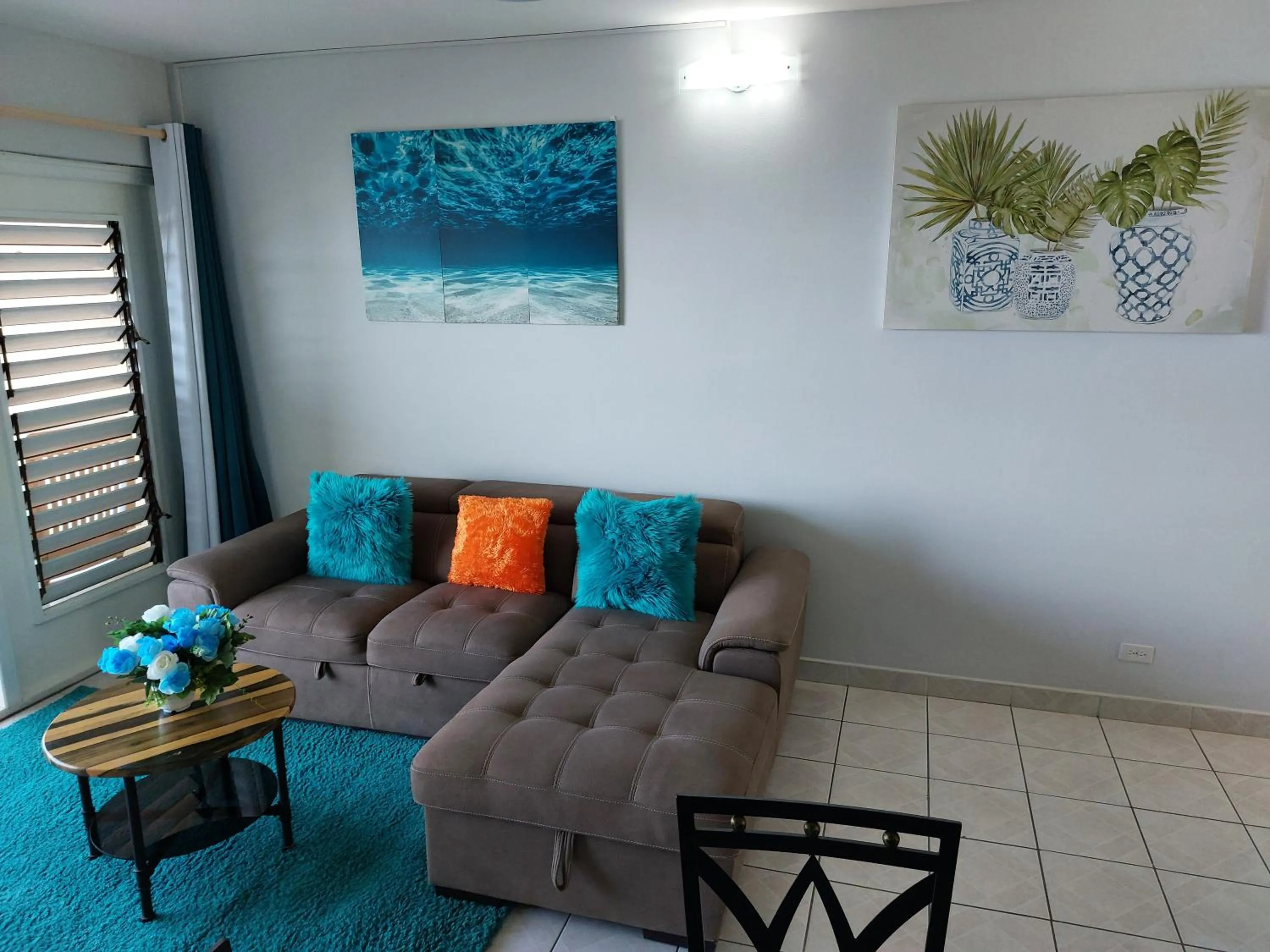 Seating area in Contemporary Ocean view 2bed Carib Ocho Rios Condo