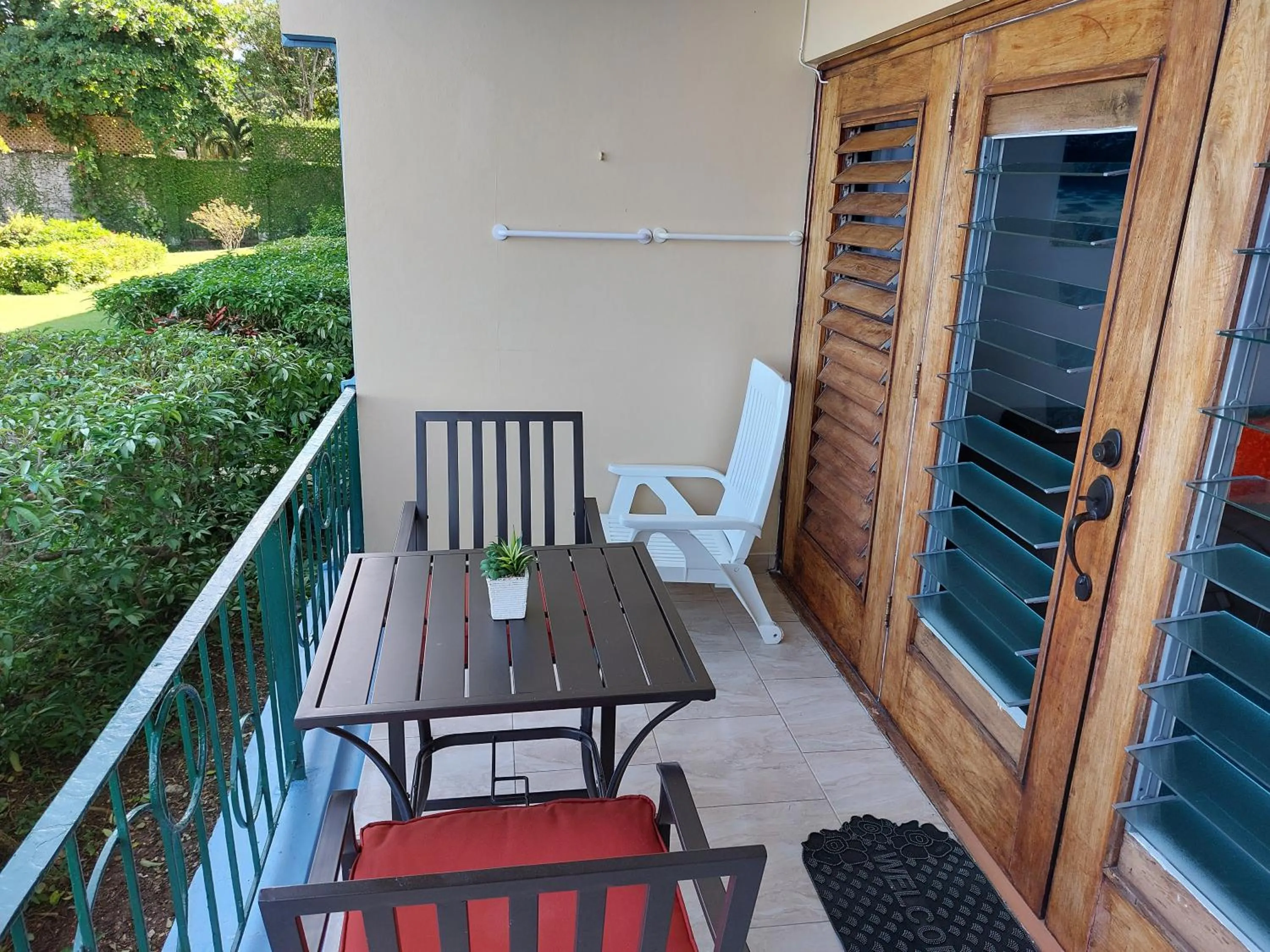 Patio in Contemporary Ocean view 2bed Carib Ocho Rios Condo