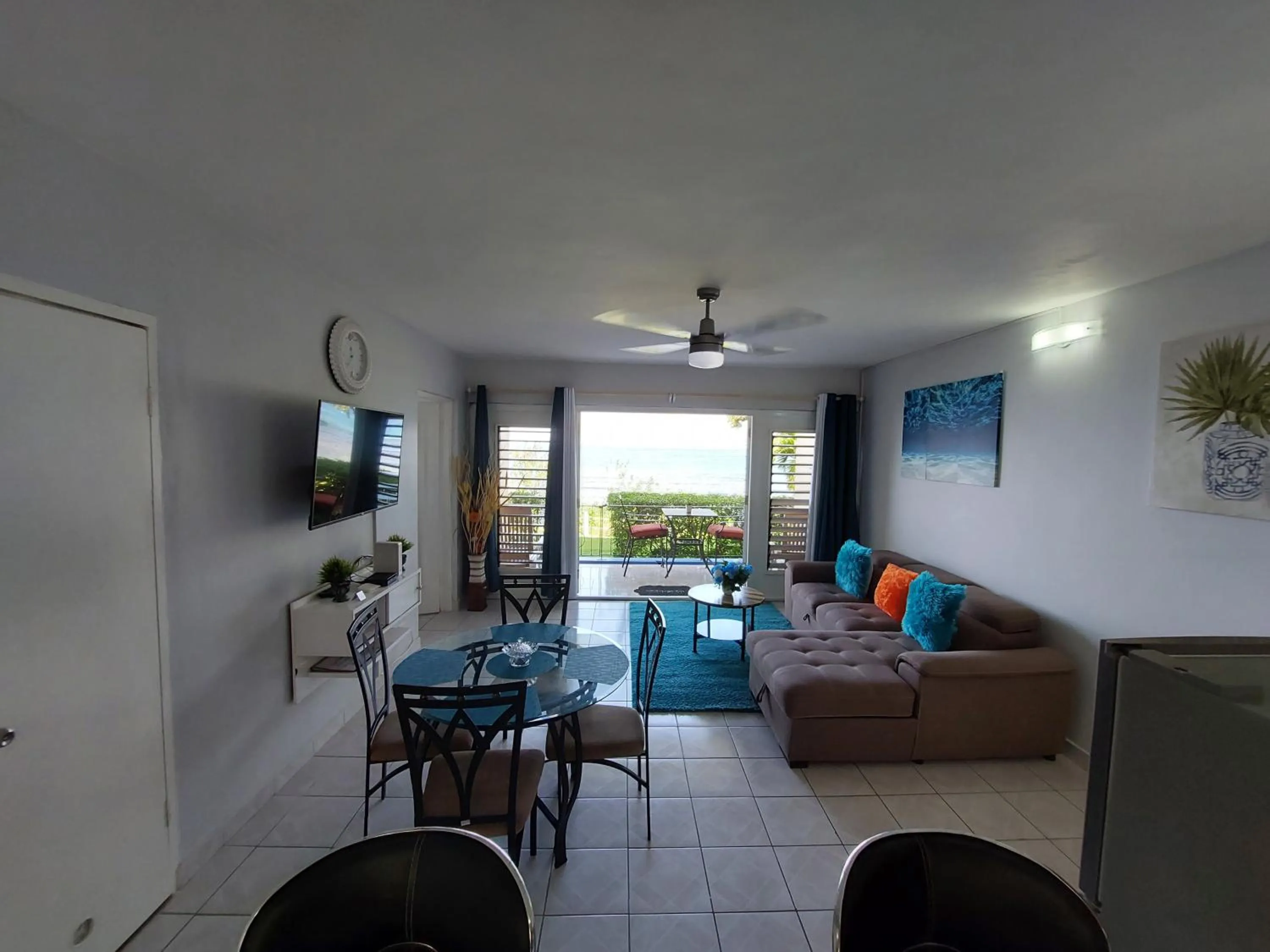 Living room in Contemporary Ocean view 2bed Carib Ocho Rios Condo