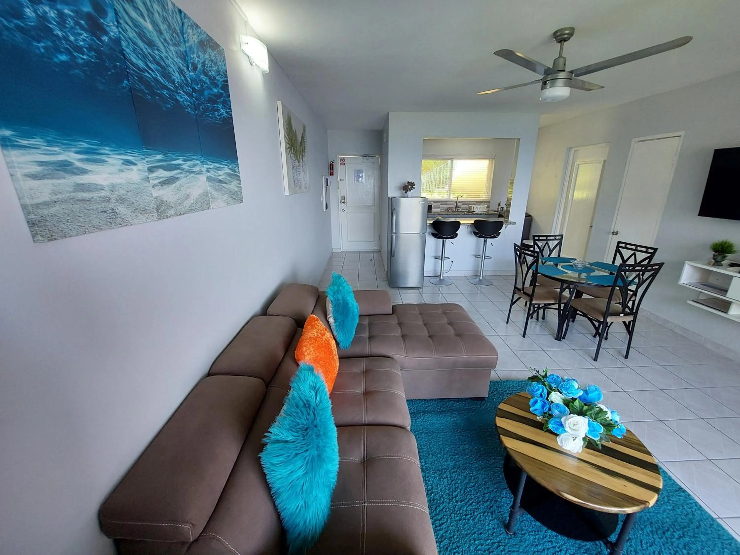Living room in Contemporary Ocean view 2bed Carib Ocho Rios Condo