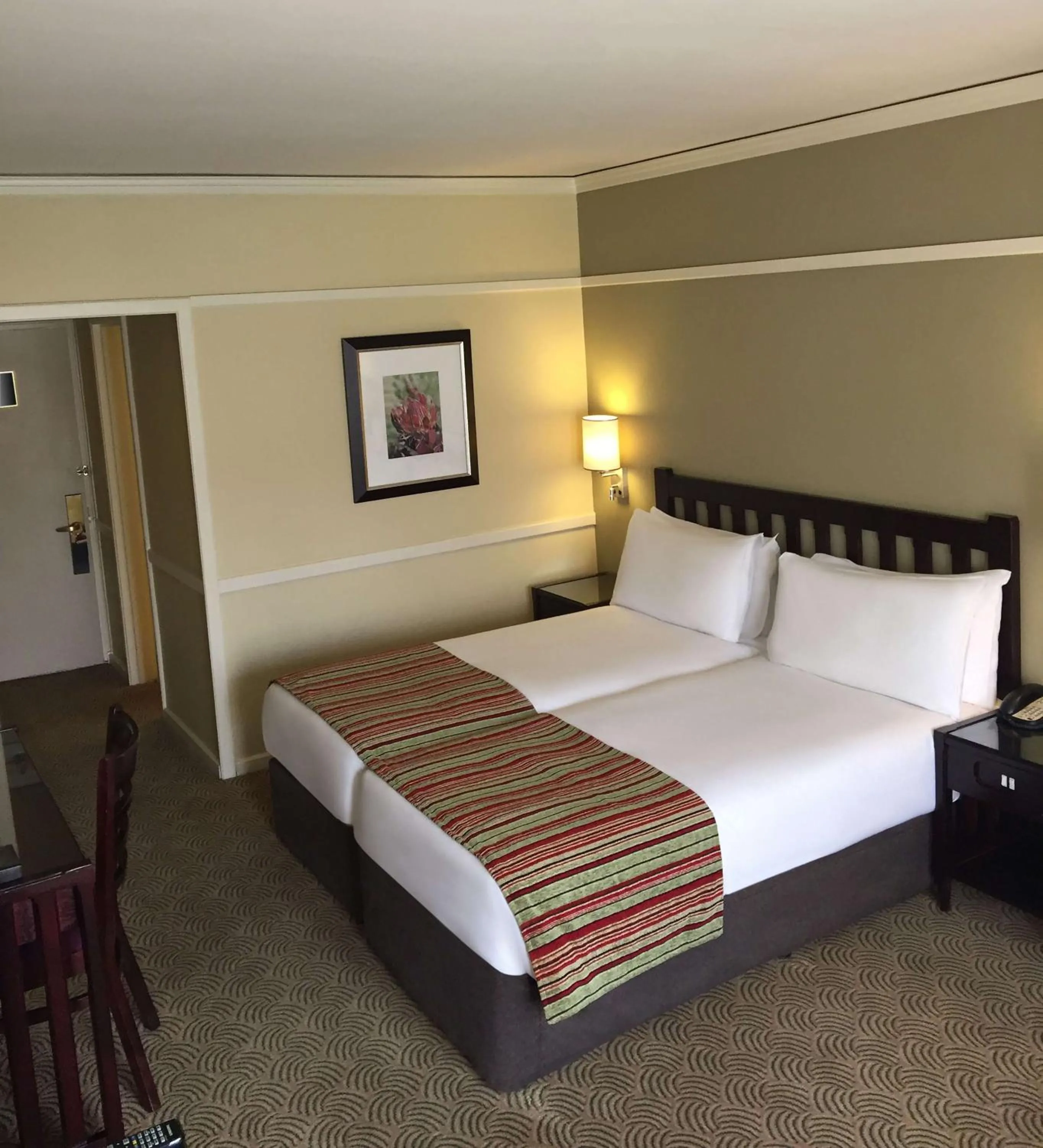 Photo of the whole room, Bed in Southern Sun Bloemfontein