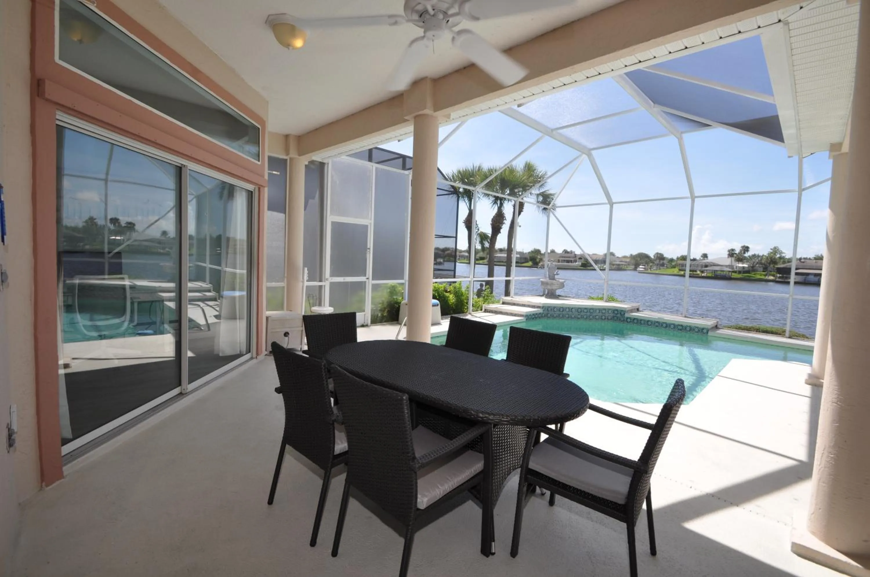 Sunset Bay Beautiful Pool Home - Bring Your Boat or Jet Ski - Canal with Dock- Sleeps 10 - 4 BD