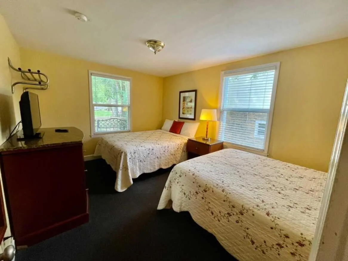 Bedroom in Geneva Hotel & Tiki Bar