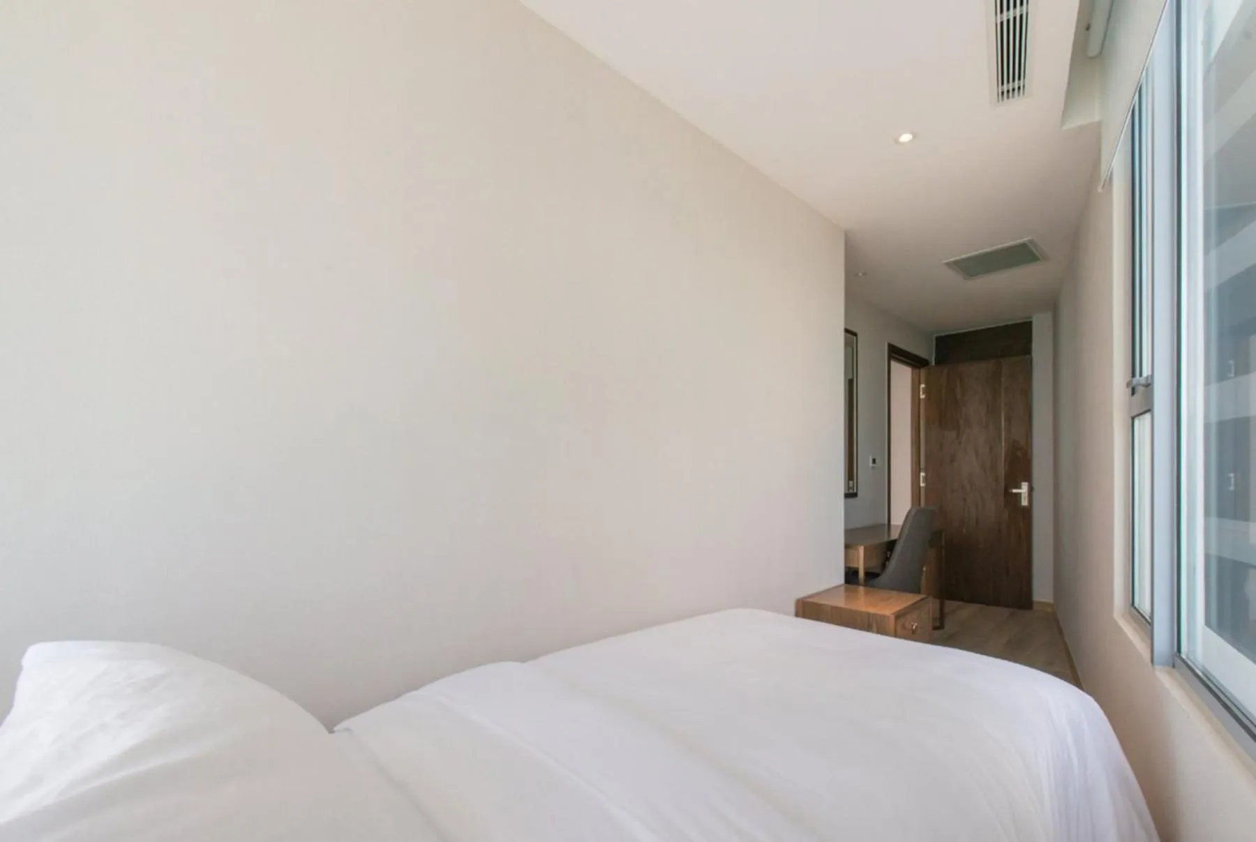 Bed in RIS Panorama Condotel