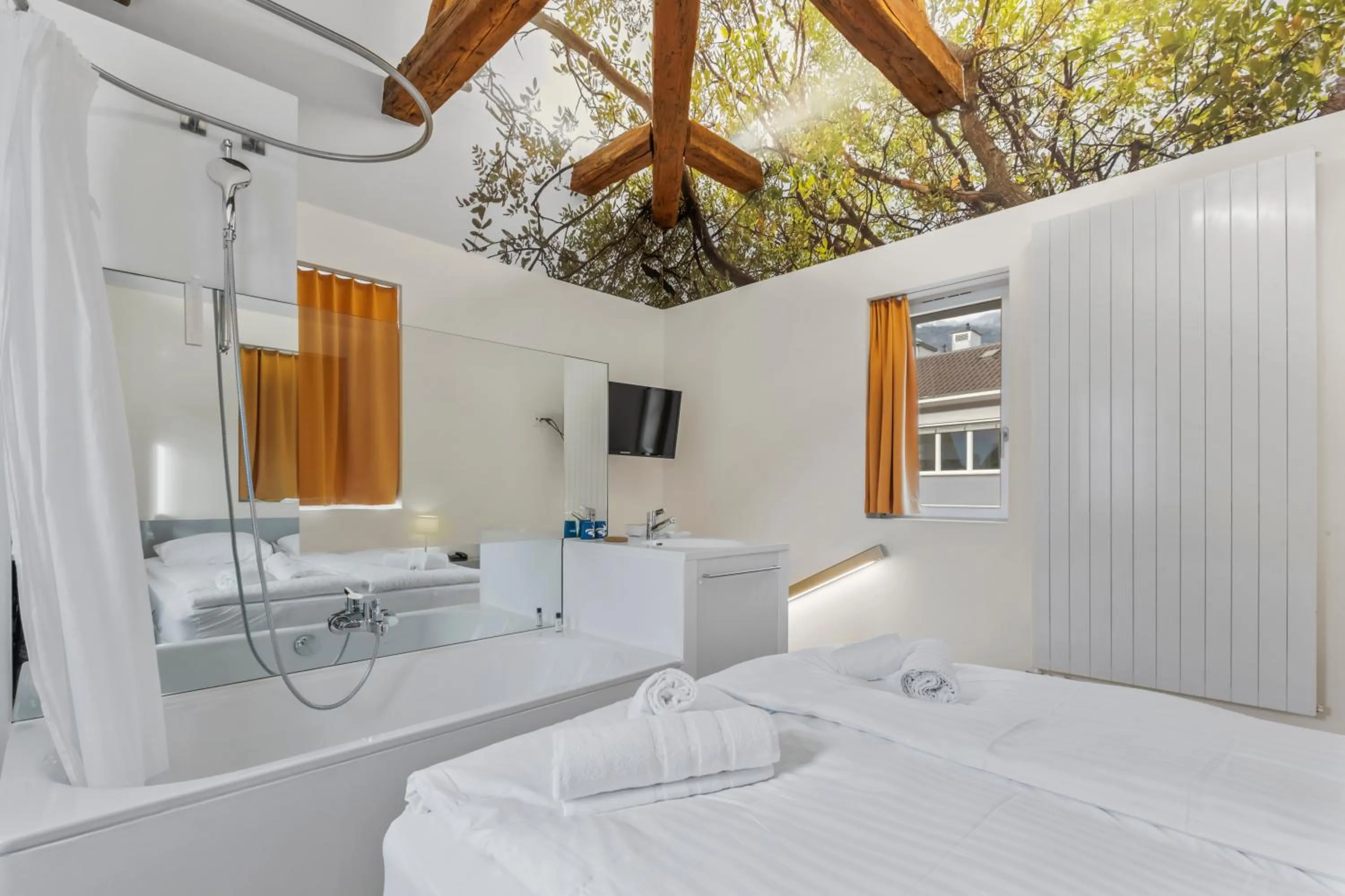 Bed in Hôtel de la Poste Sierre