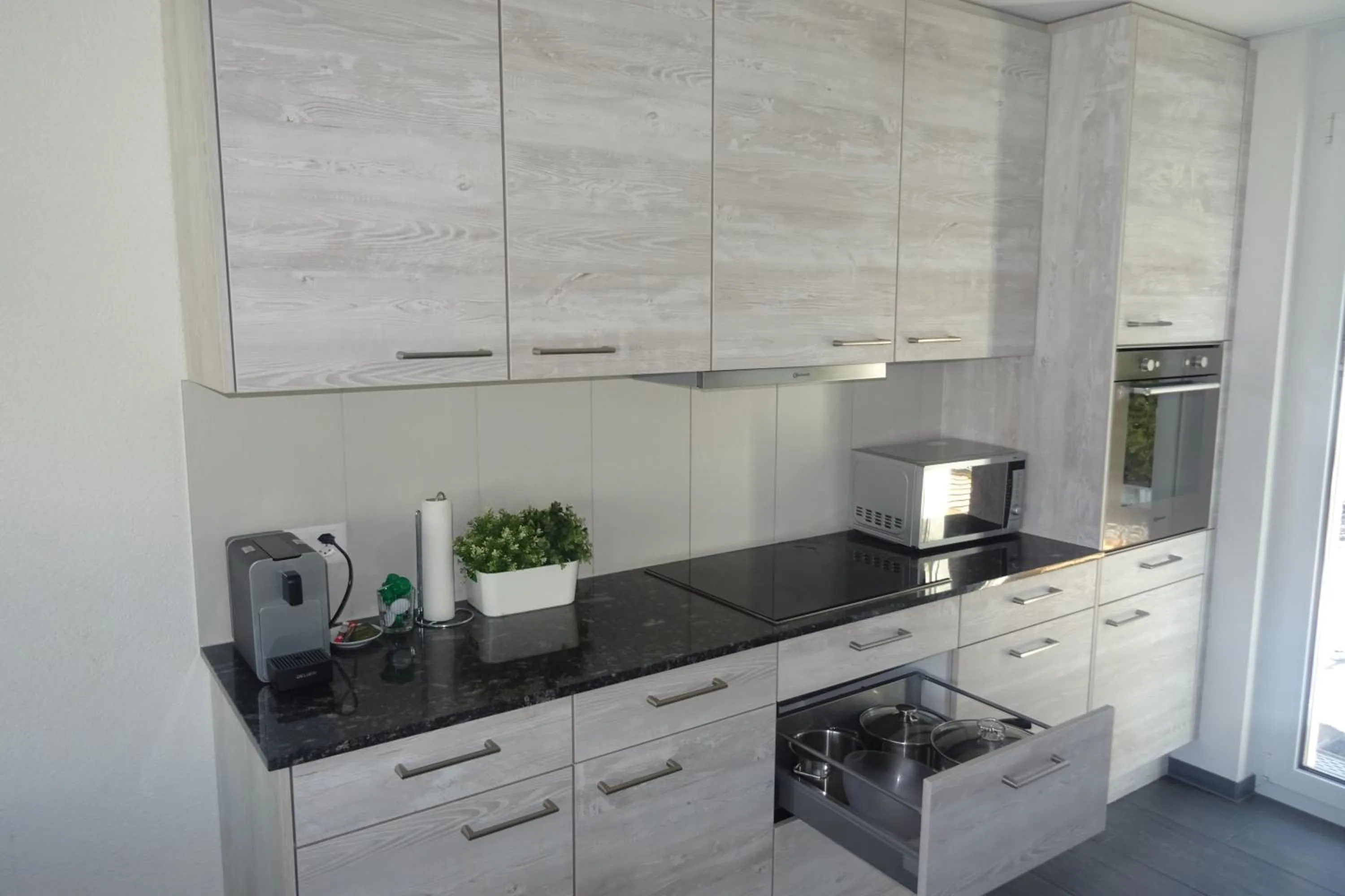 Kitchen or kitchenette in The Golf apartments