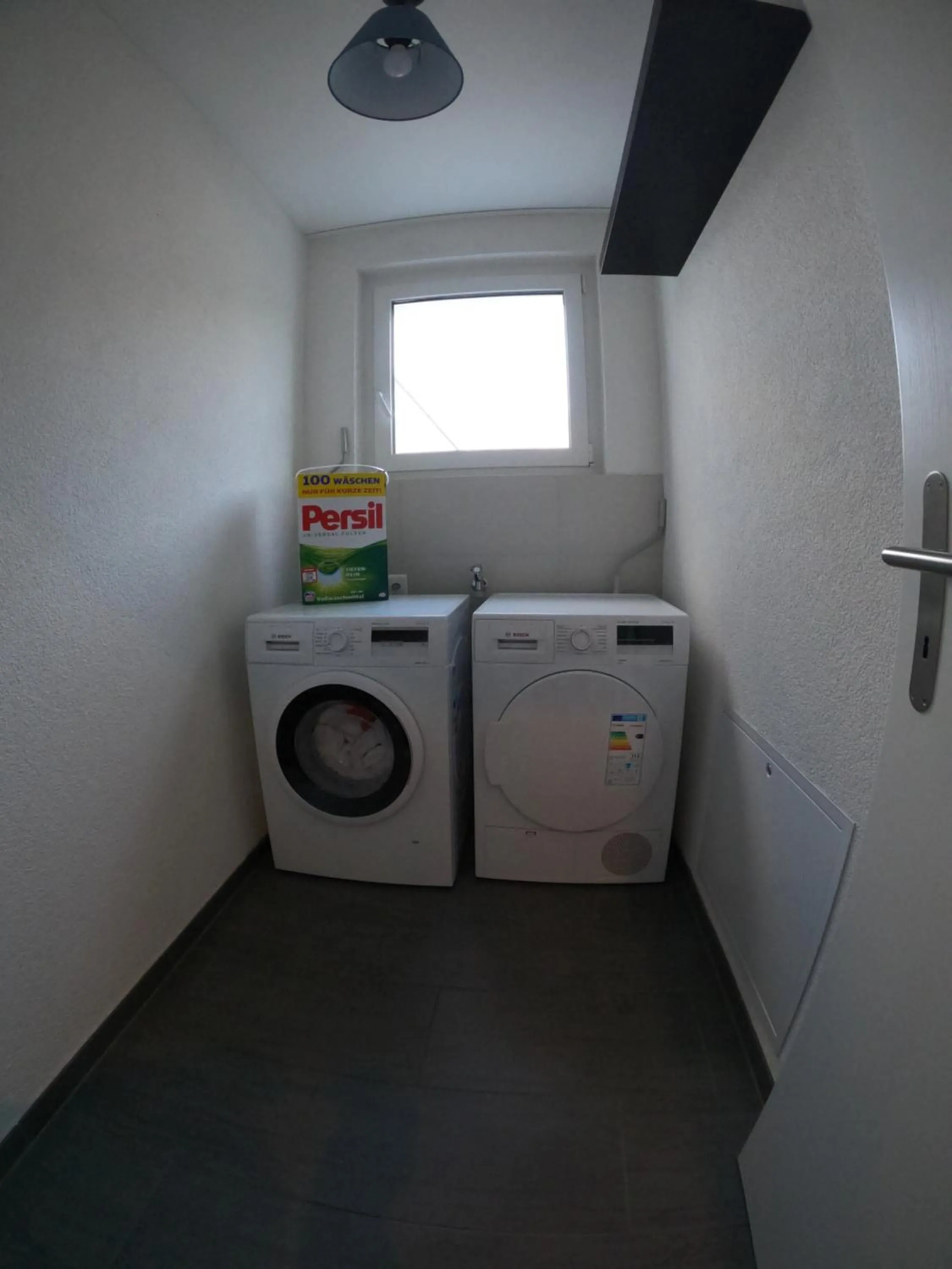 washing machine in The Golf apartments