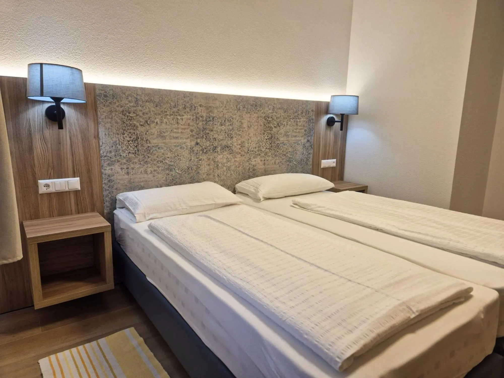 Bed in Apartments Roemerschlucht