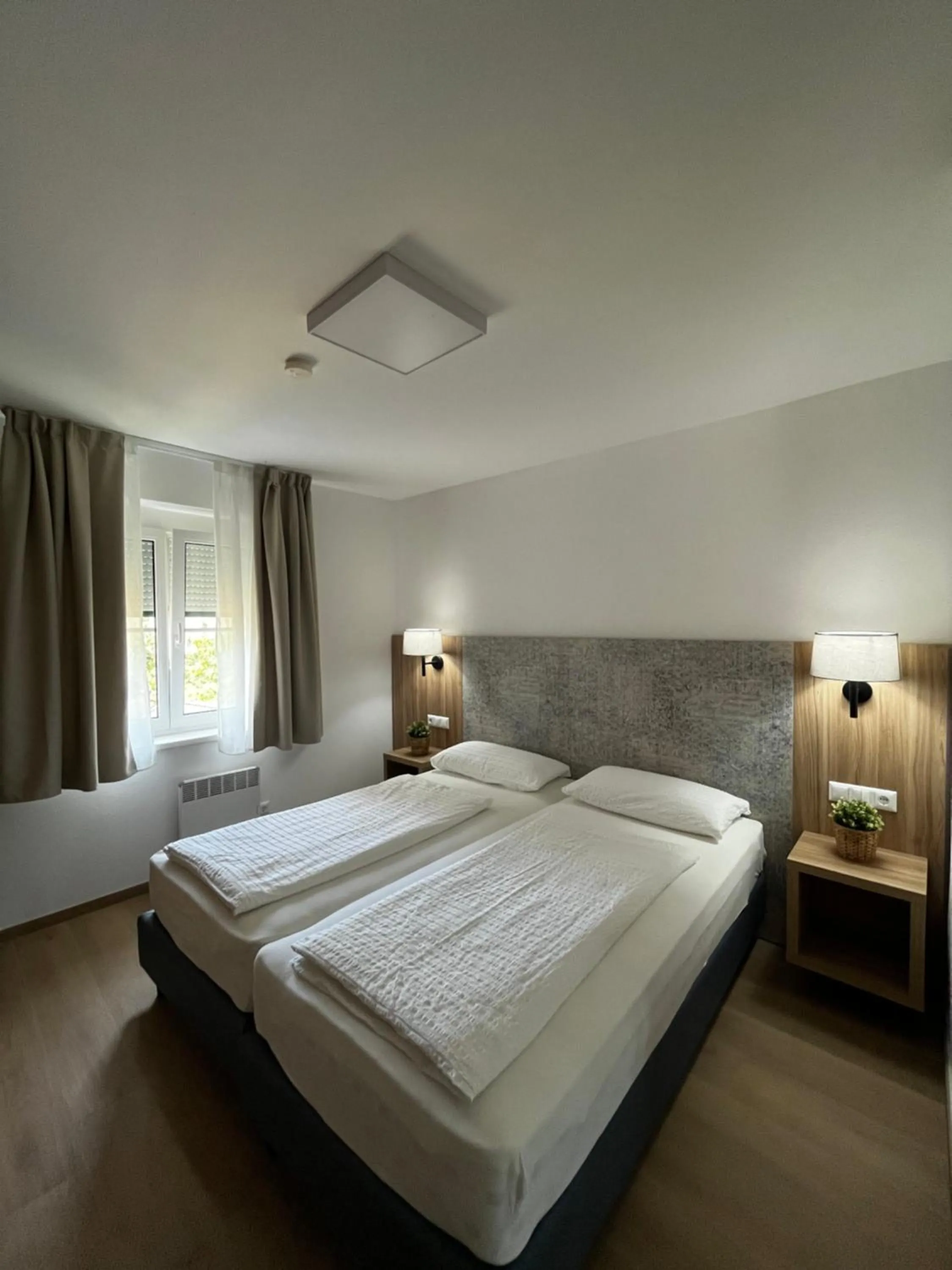 Bed in Apartments Roemerschlucht