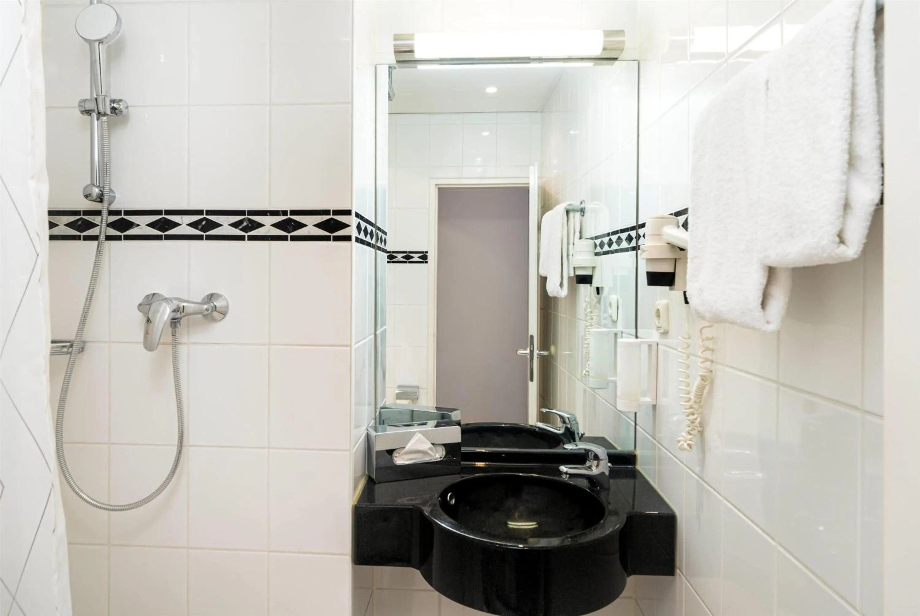 Bathroom in elaya hotel hannover city, Trademark by Wyndham