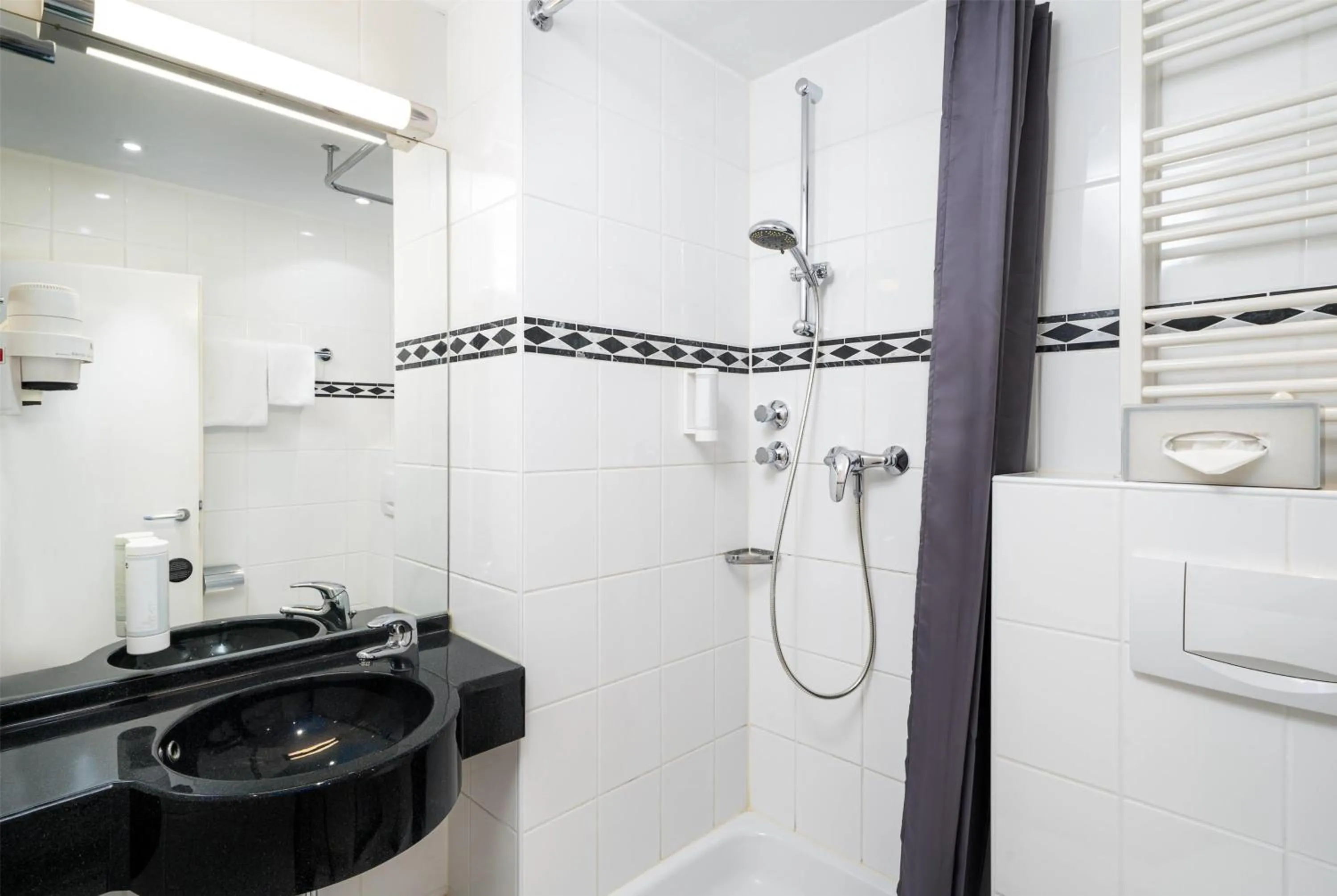 Bathroom in elaya hotel hannover city, Trademark by Wyndham