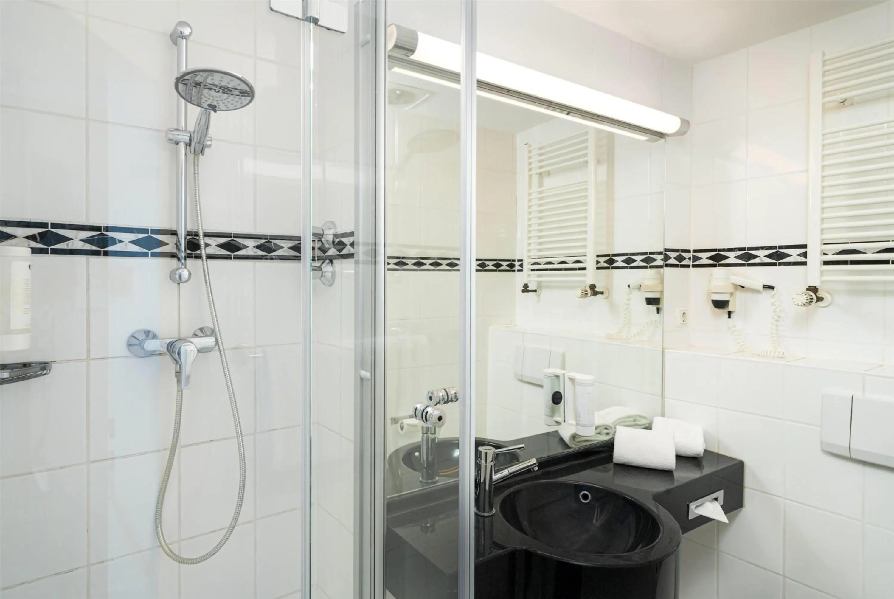 Bathroom in elaya hotel hannover city, Trademark by Wyndham