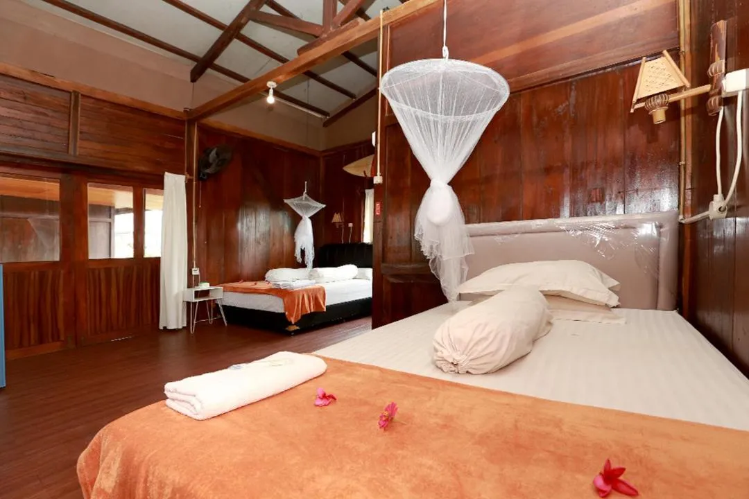 Bed in Arya's Surf Camp Cimaja