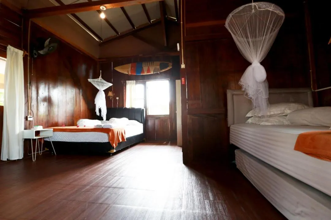 Bed in Arya's Surf Camp Cimaja