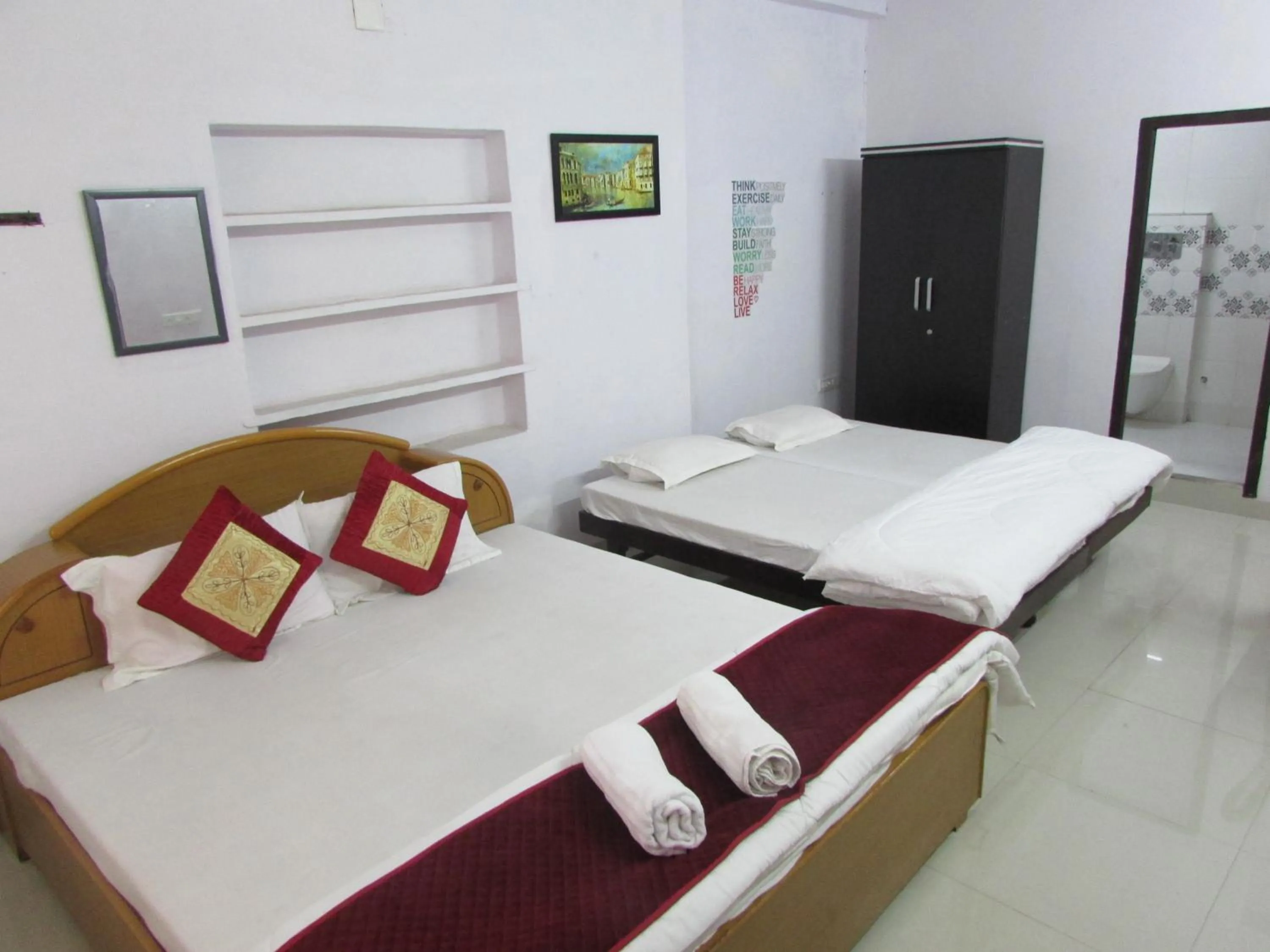 Bed in Ashish Guest House, Goverdhan Vilas