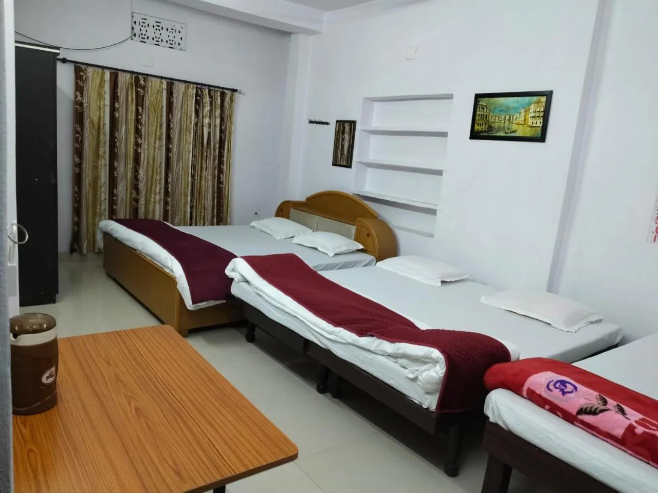 Bed in Ashish Guest House, Goverdhan Vilas