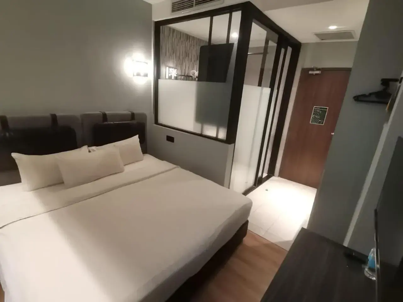 Bed in The Seraya Hotel Bed in The Seraya Hotel