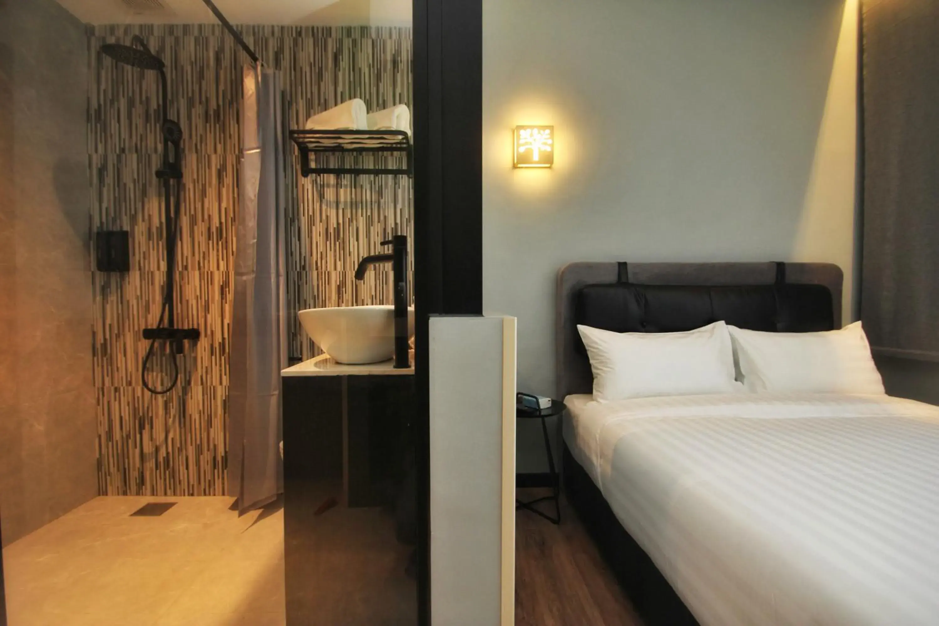 Bed in The Seraya Hotel Bed in The Seraya Hotel