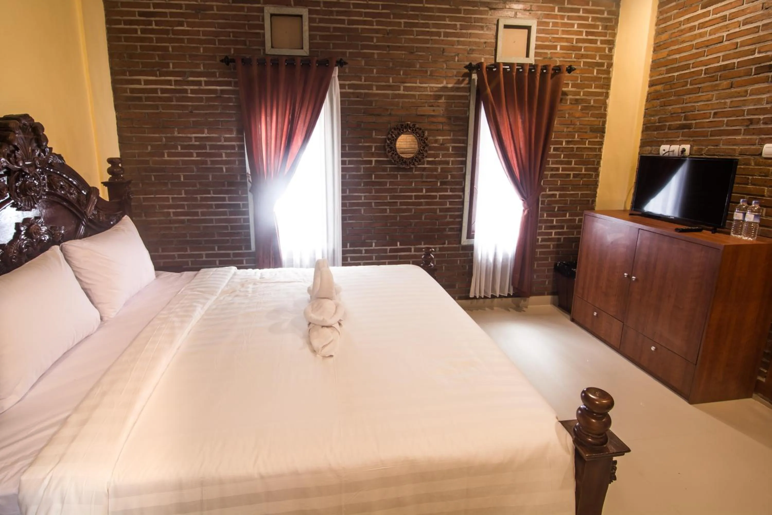 Bed in The Garuda Homestay Sanur