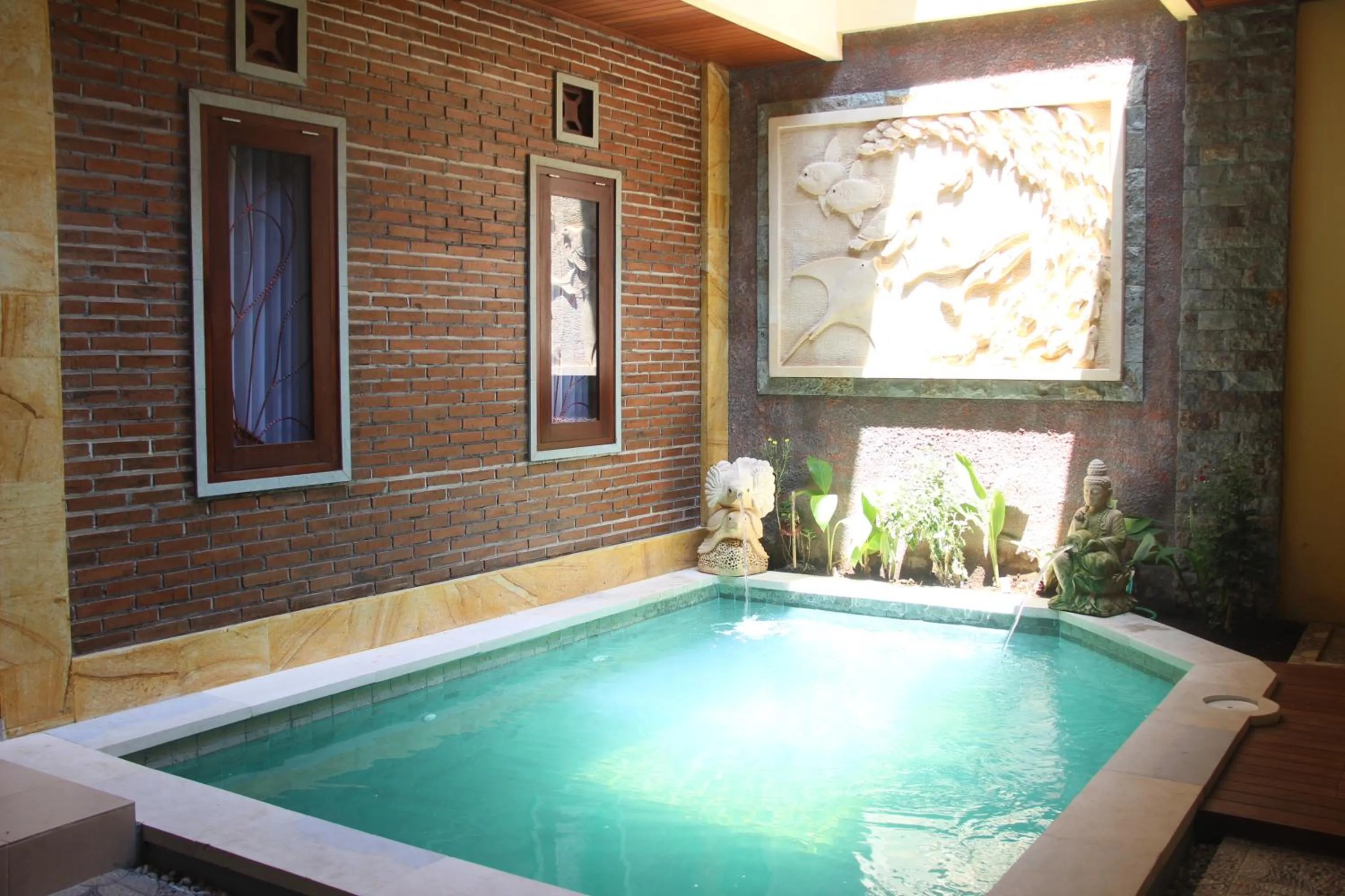 Swimming pool in The Garuda Homestay Sanur
