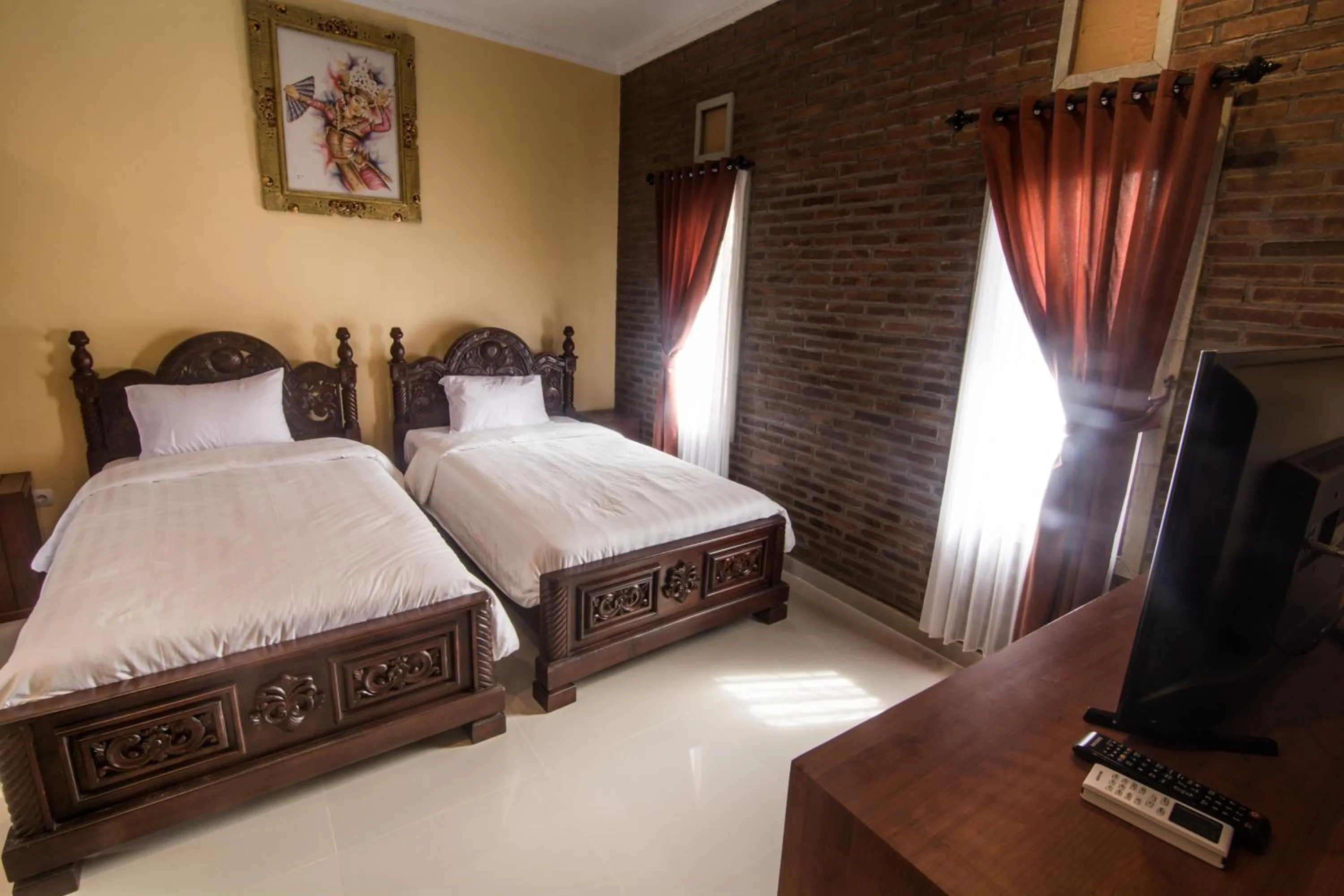 Bed in The Garuda Homestay Sanur